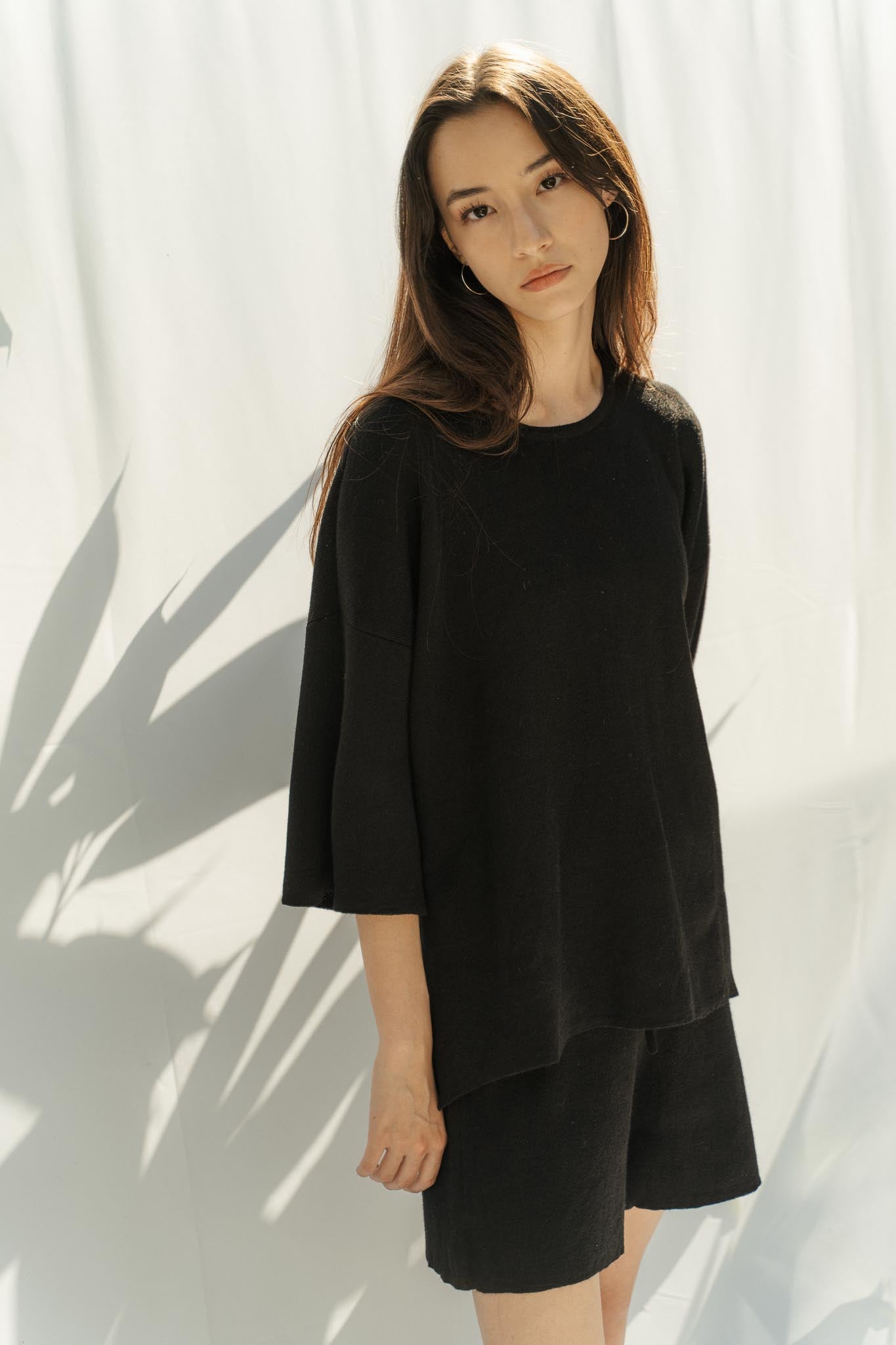 The Solace Tee Sweater in Black