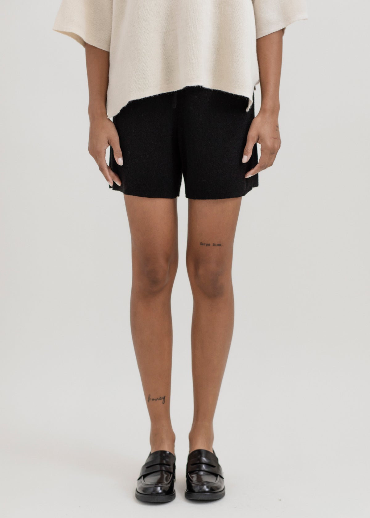 Airy Shorts in Black, alpaca and silk knit shorts by Ahblo, worn by model