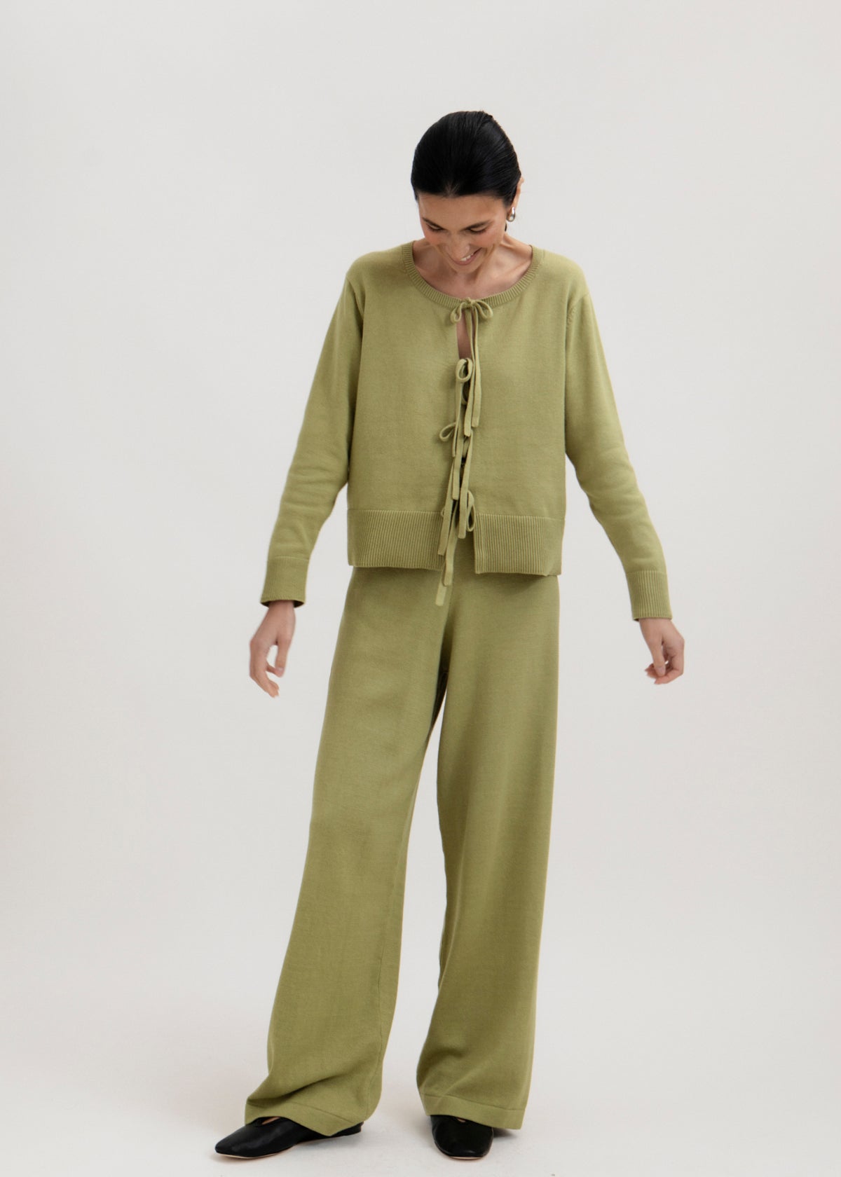 Alba Pants in Olive, cotton and baby alpaca wide-leg pants by Ahblo, worn by model