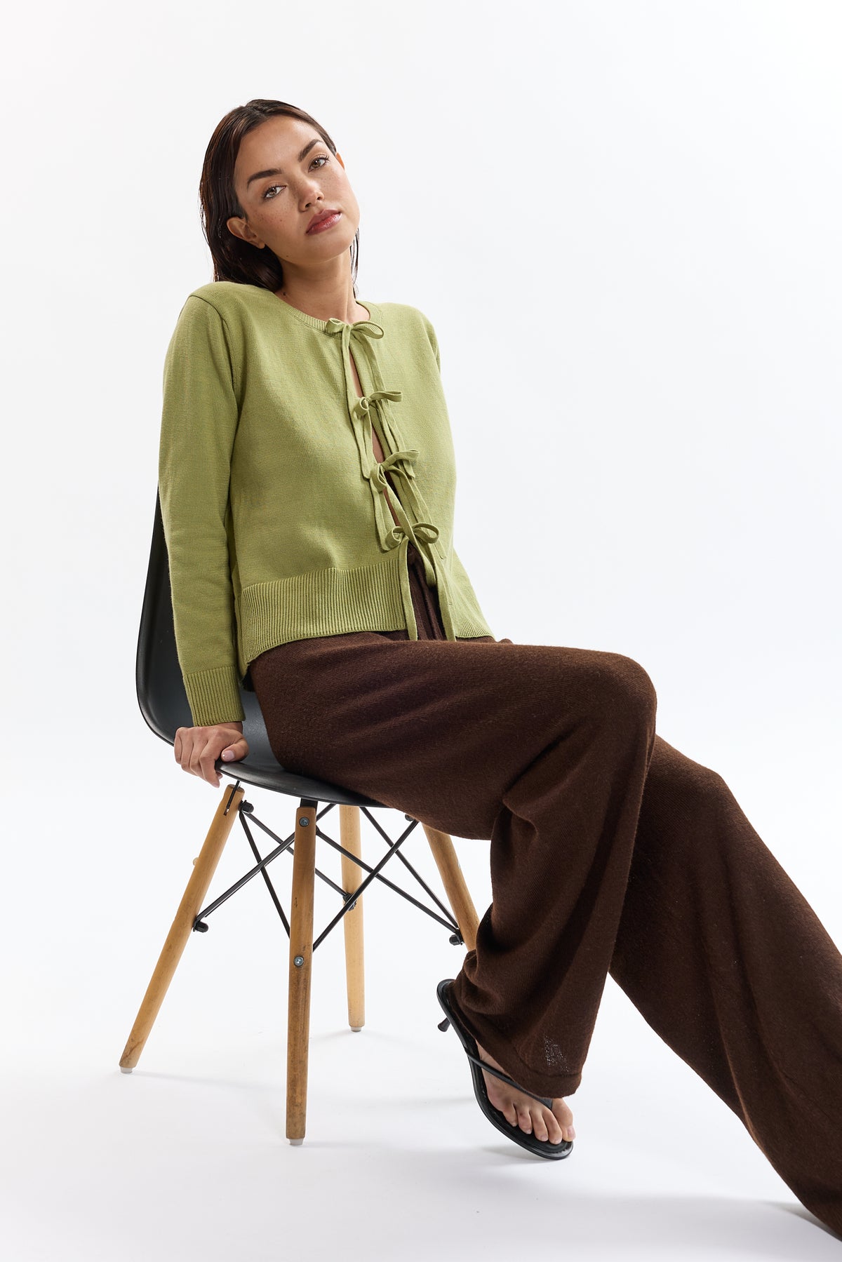 Amaya Cardigan in Olive, cotton and baby alpaca bow cardigan by Ahblo, worn by model