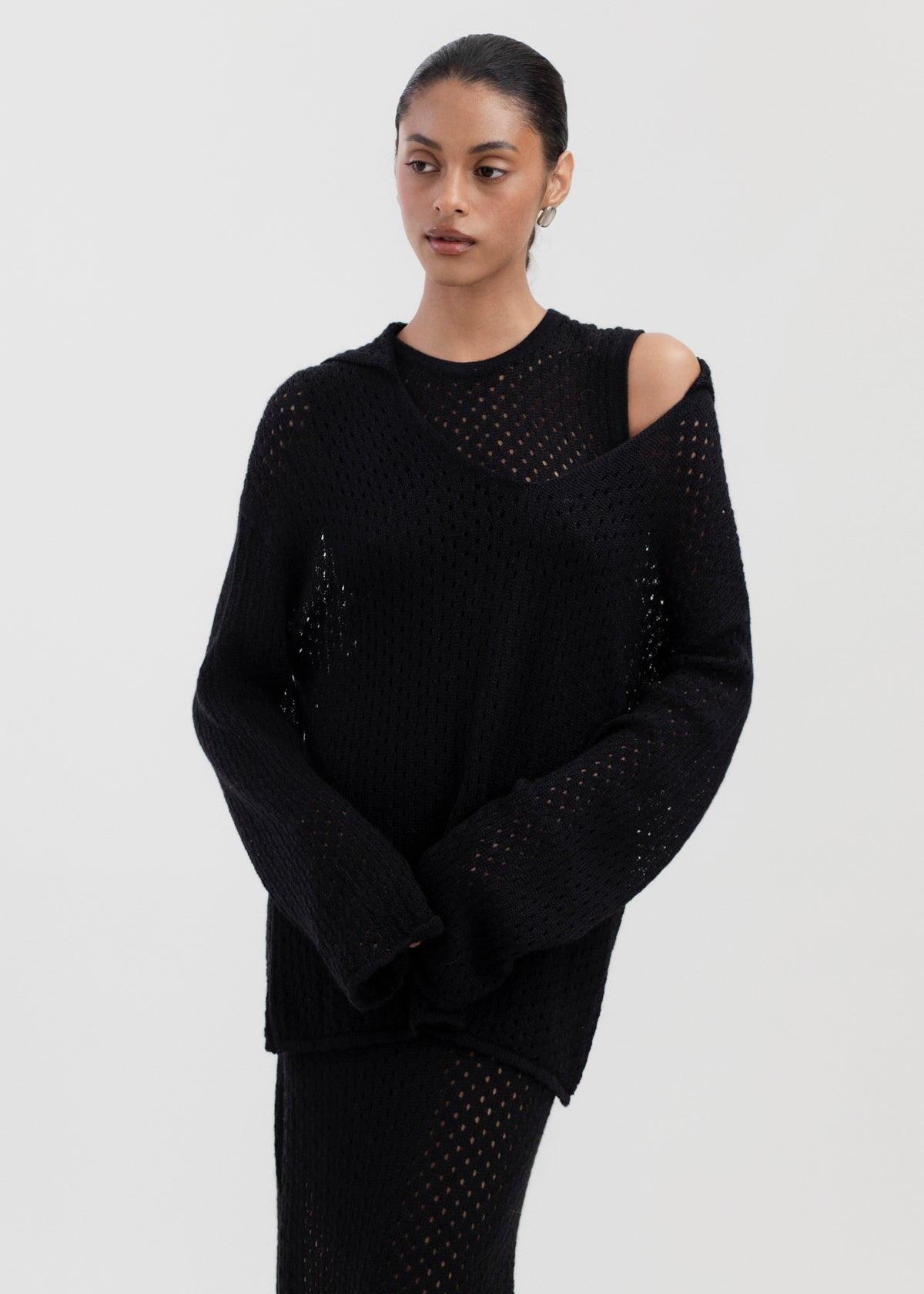 Aurora Dress in Black, baby alpaca knit maxi dress by Ahblo, worn by model