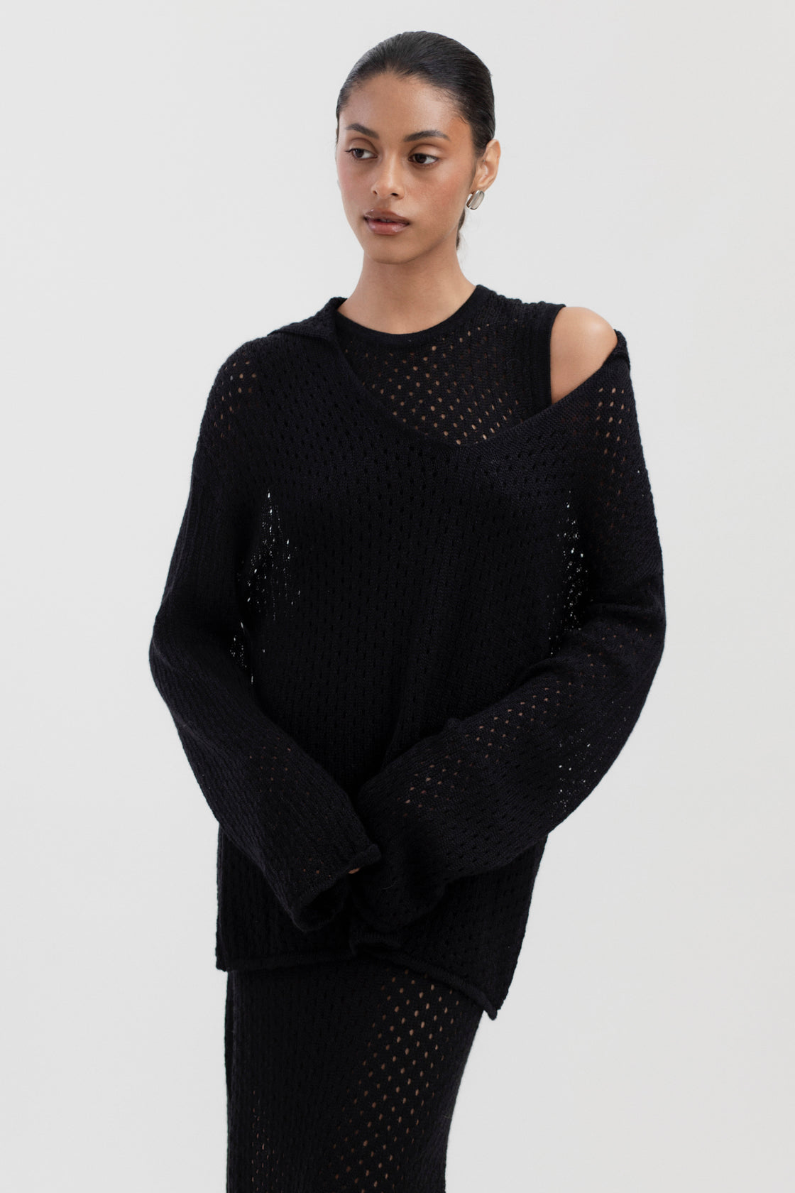 Aurora Dress in Black, baby alpaca knit maxi dress by Ahblo, worn by model