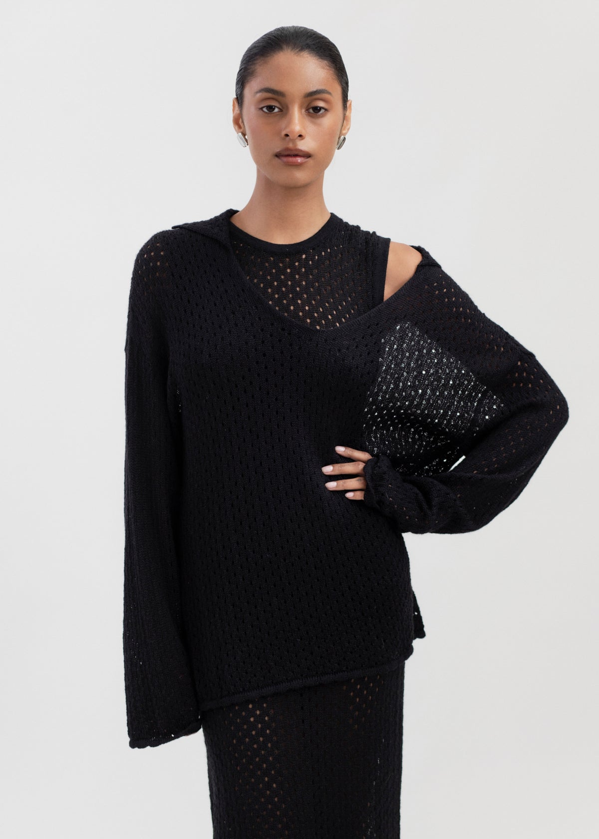 Aurora Dress in Black, baby alpaca knit maxi dress by Ahblo, worn by model