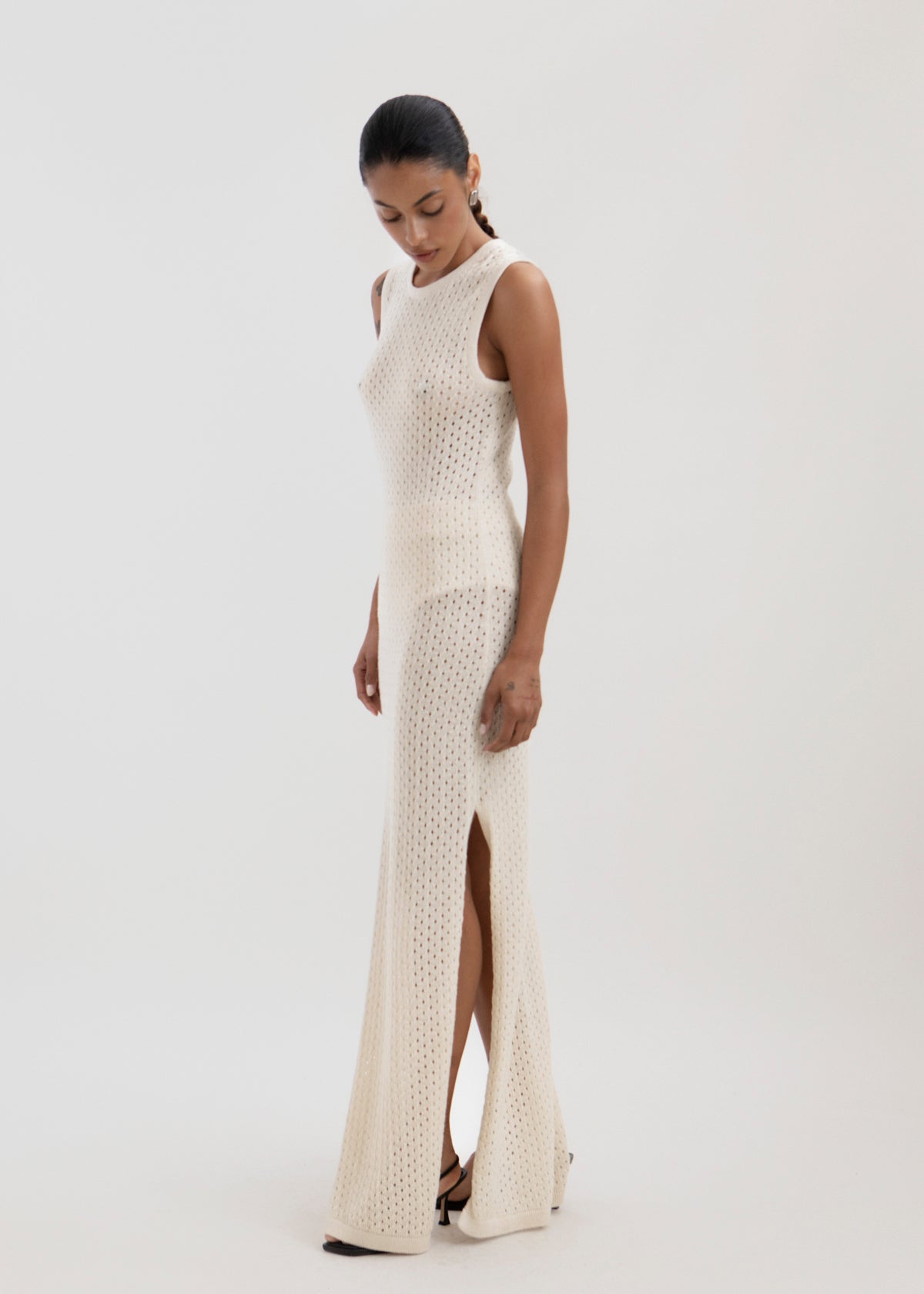 Aurora Dress in Cream, baby alpaca knit maxi dress by Ahblo, worn by model