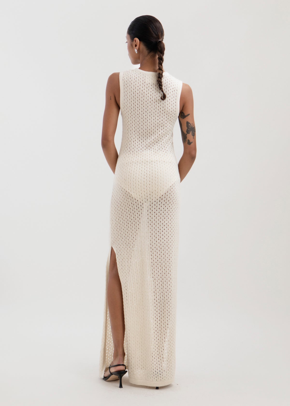 Aurora Dress in Cream, baby alpaca knit maxi dress by Ahblo, worn by model