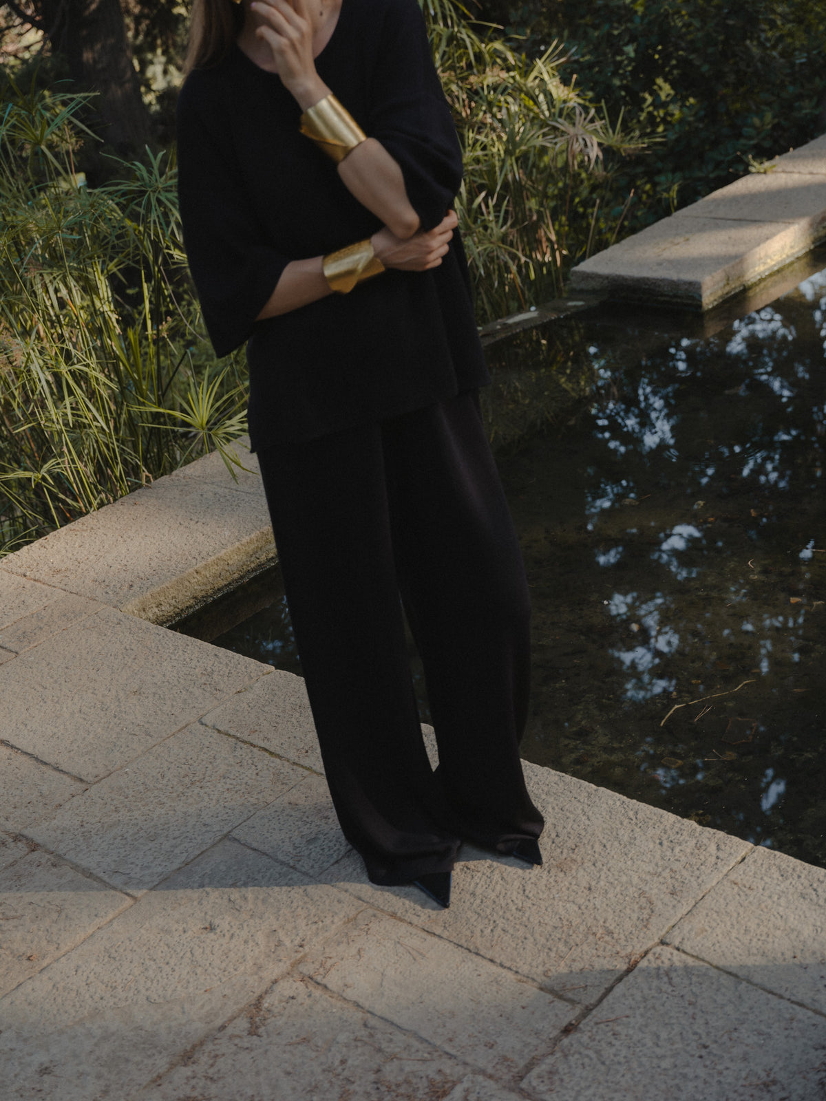 Avery Trousers in Black, baby alpaca wide-leg knit trousers by Ahblo, close-up