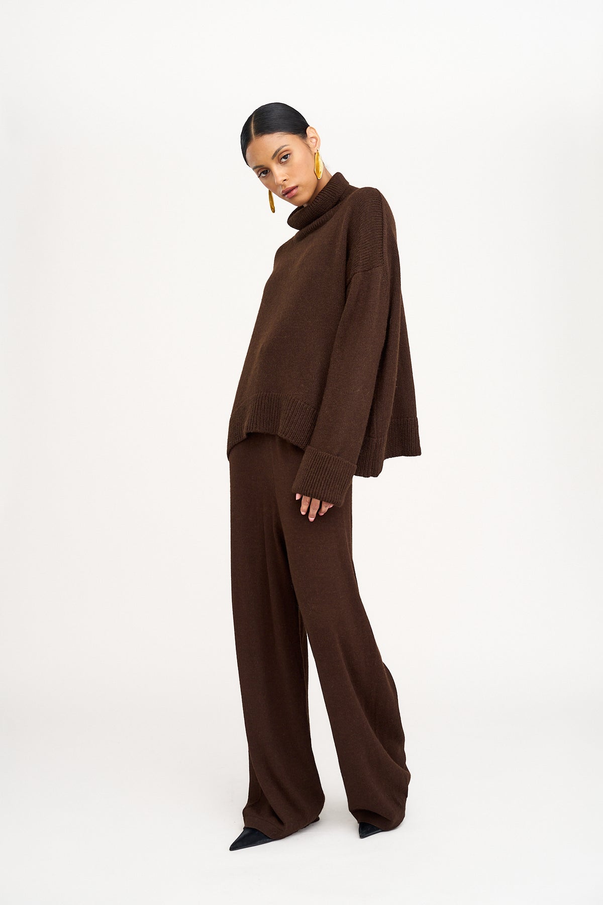 Avery Trousers in Chocolate Brown, baby alpaca wide-leg knit trousers by Ahblo, worn by model