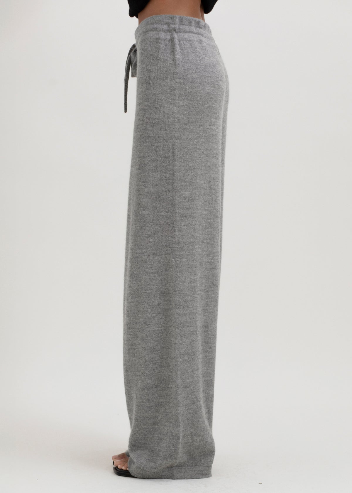 Avery Trousers in Mist Grey, baby alpaca wide-leg knit trousers by Ahblo, worn by model