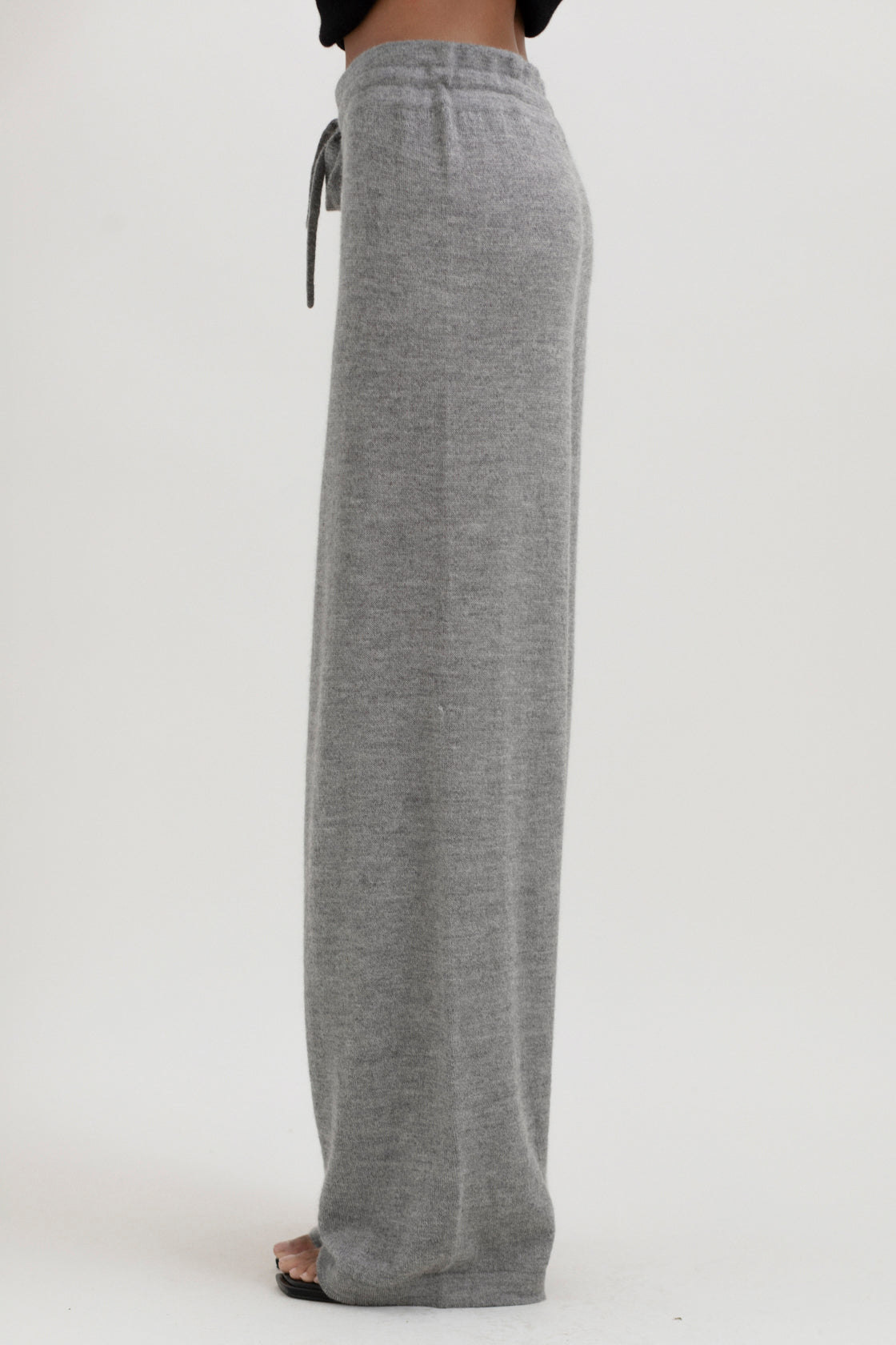 Avery Trousers in Mist Grey, baby alpaca wide-leg knit trousers by Ahblo, worn by model