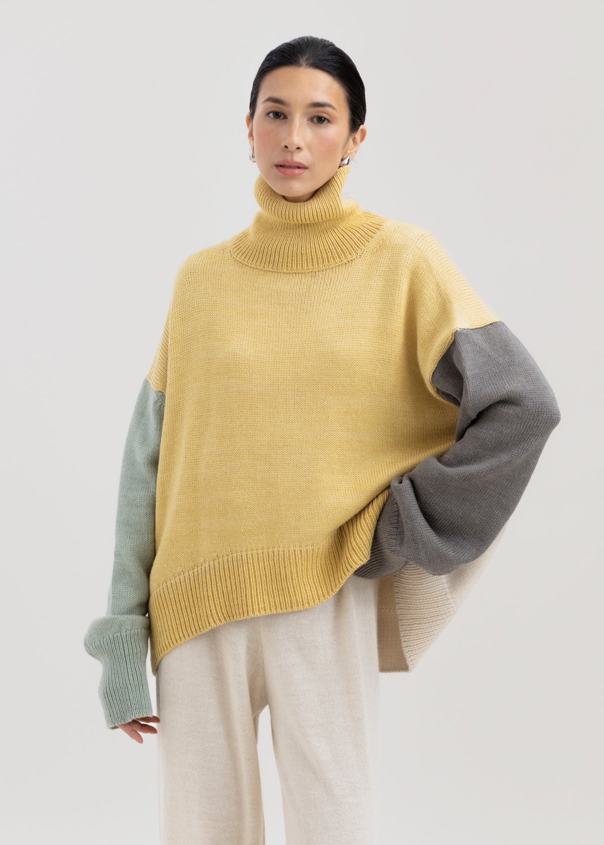 Cedar Colorblock Sweater in Buttercream Mix, oversized baby alpaca colorblock turtleneck sweater by Ahblo, worn by model