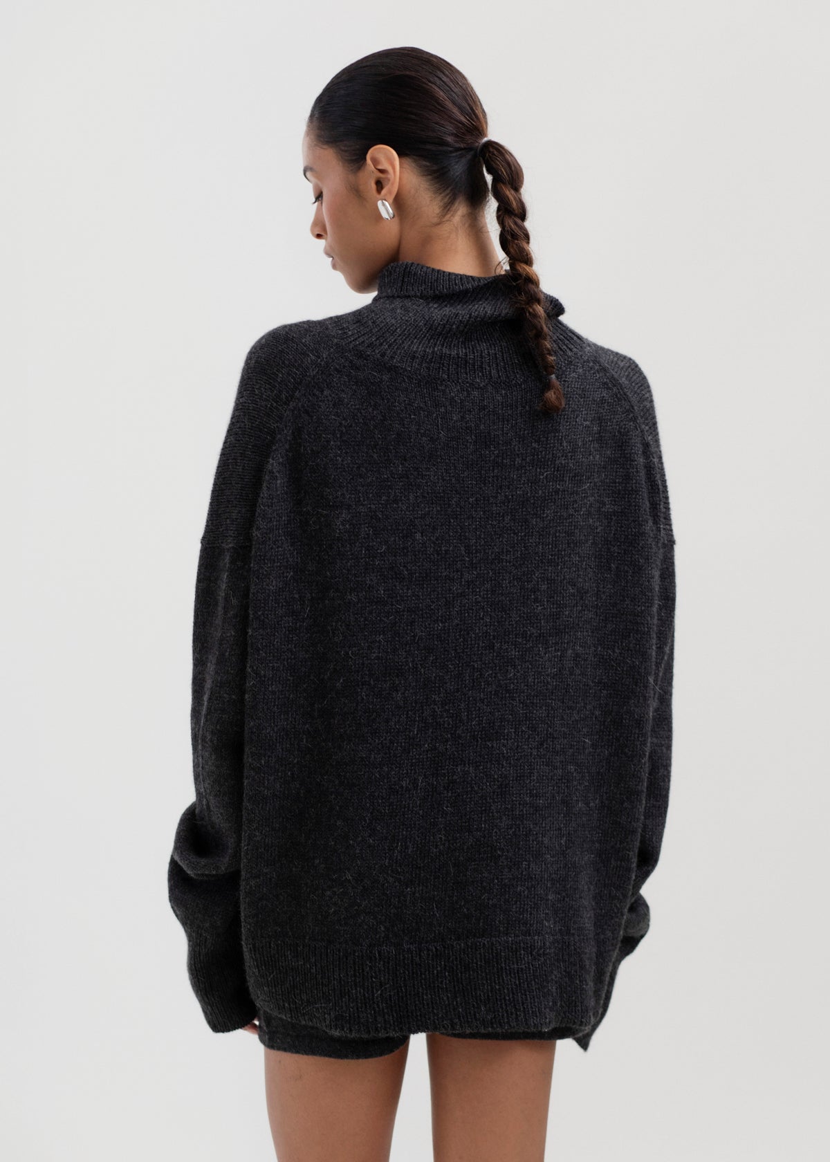 Cedar Sweater in Charcoal, oversized baby alpaca turtleneck sweater by Ahblo, worn by model