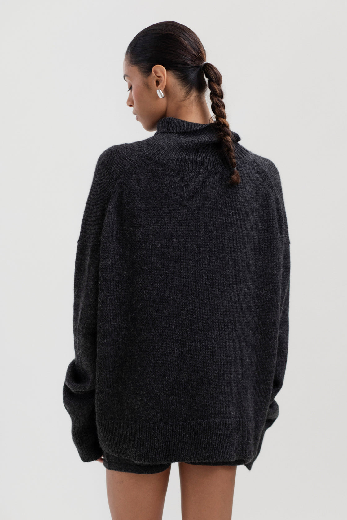 Cedar Sweater in Charcoal, oversized baby alpaca turtleneck sweater by Ahblo, worn by model