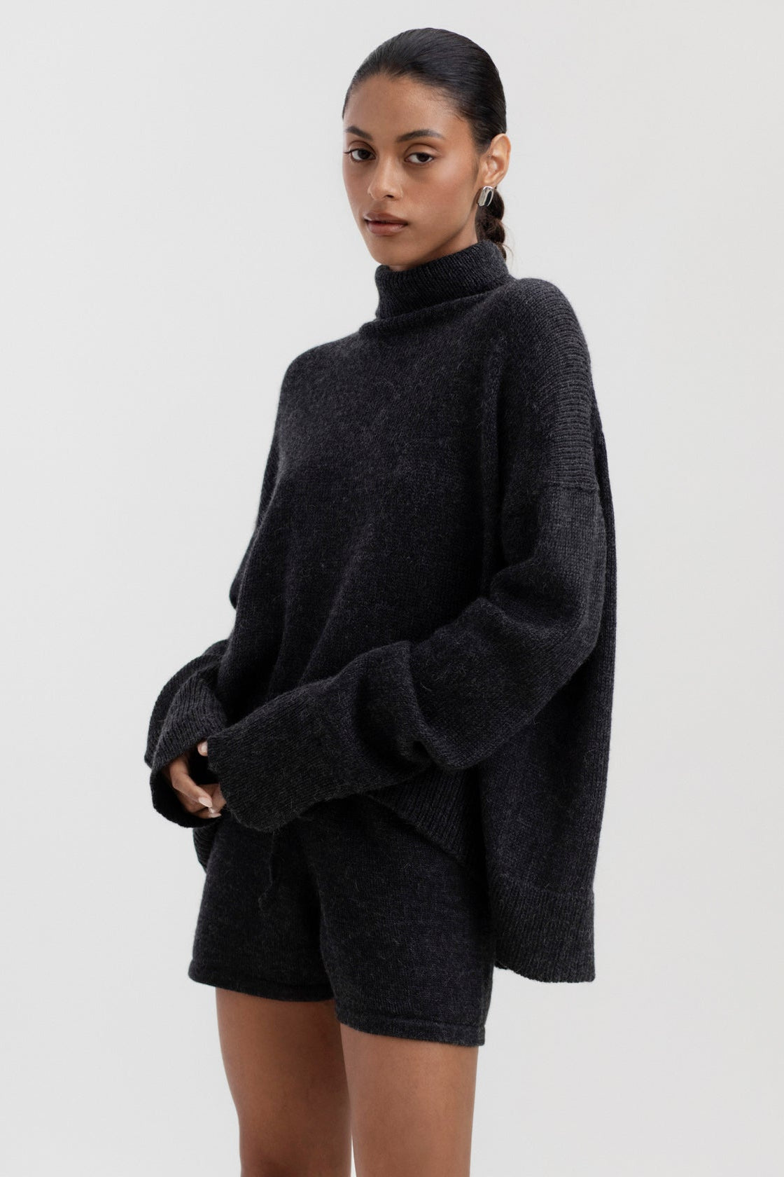 Cedar Sweater and Cove Shorts in Charcoal, baby alpaca knitwear by Ahblo, worn by model