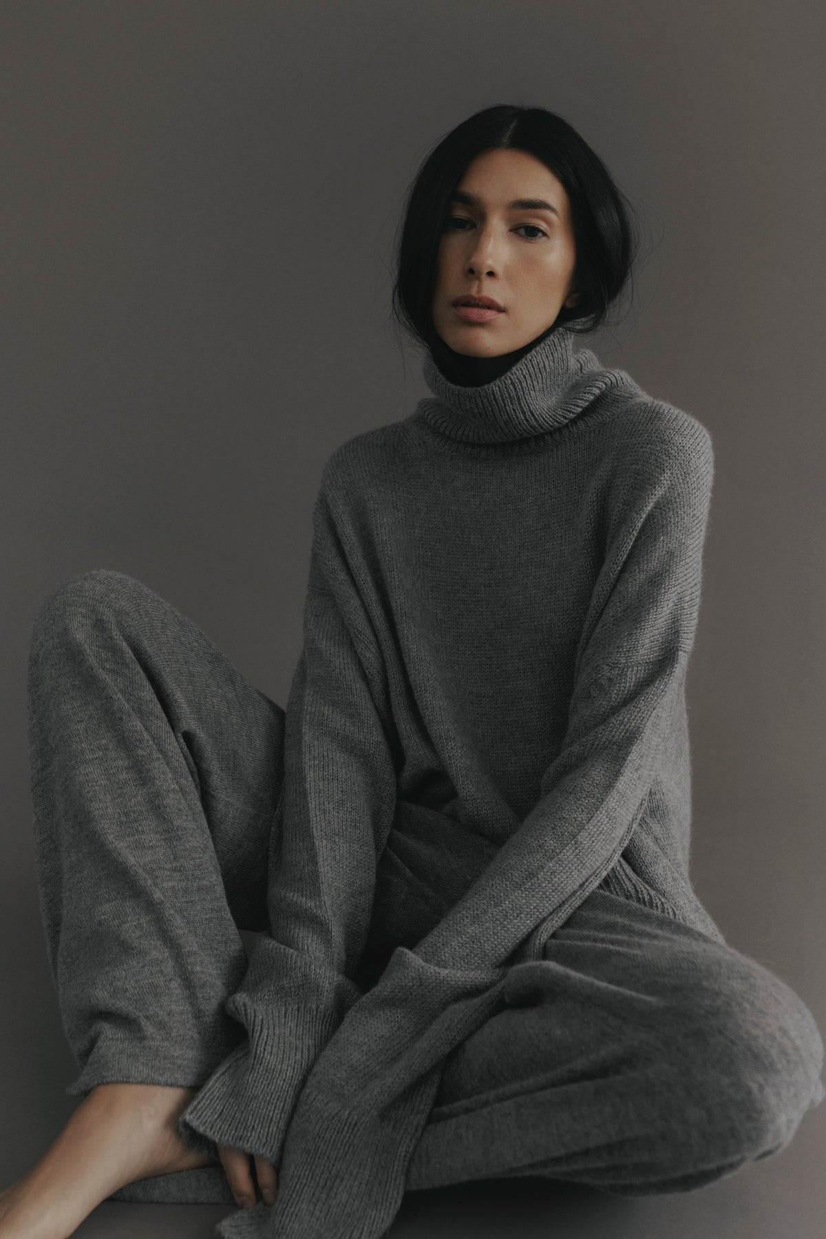 Cedar Sweater in Mist Grey, oversized baby alpaca turtleneck sweater by Ahblo, worn by model