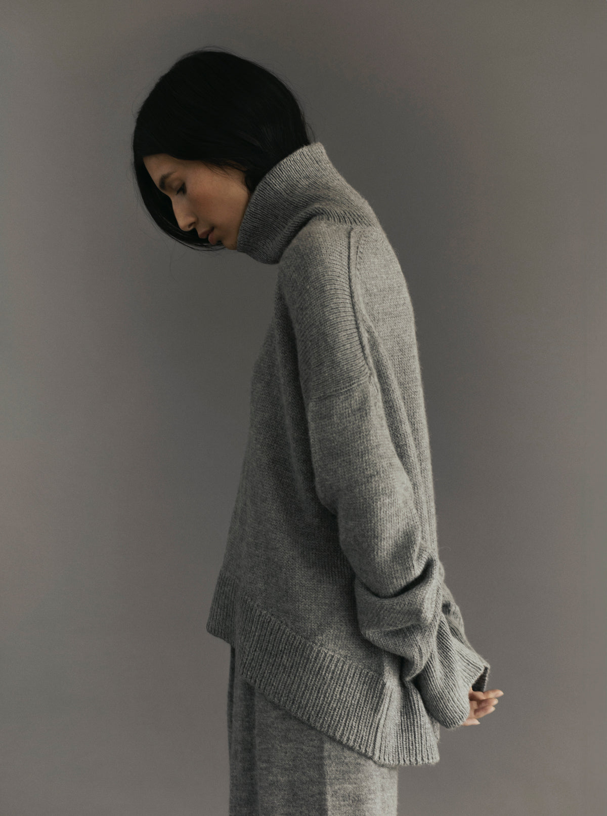 Cedar Sweater in Mist Grey, oversized baby alpaca turtleneck sweater by Ahblo, worn by model