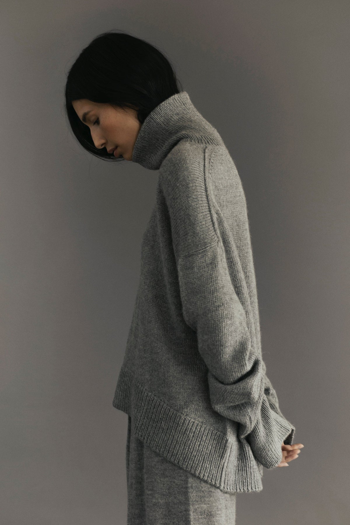Cedar Sweater in Mist Grey, oversized baby alpaca turtleneck sweater by Ahblo, worn by model