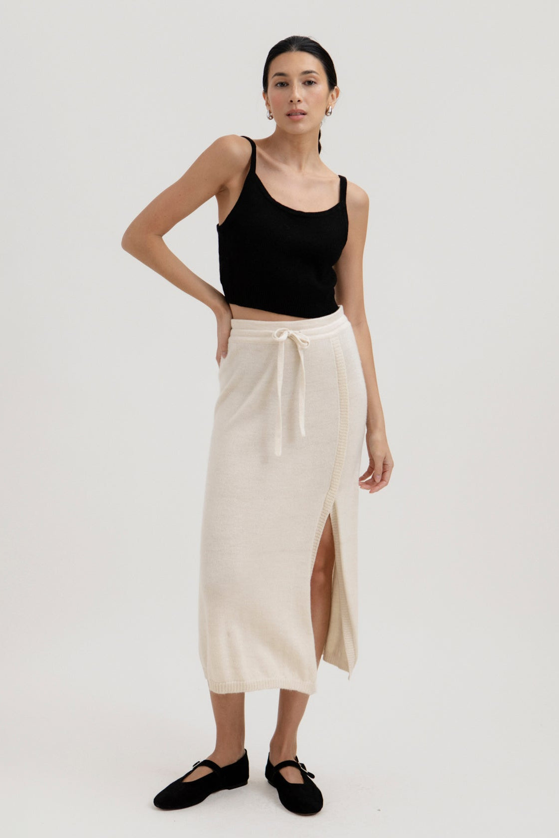 Halo Top in Black, alpaca knit cropped top by Ahblo, worn by model