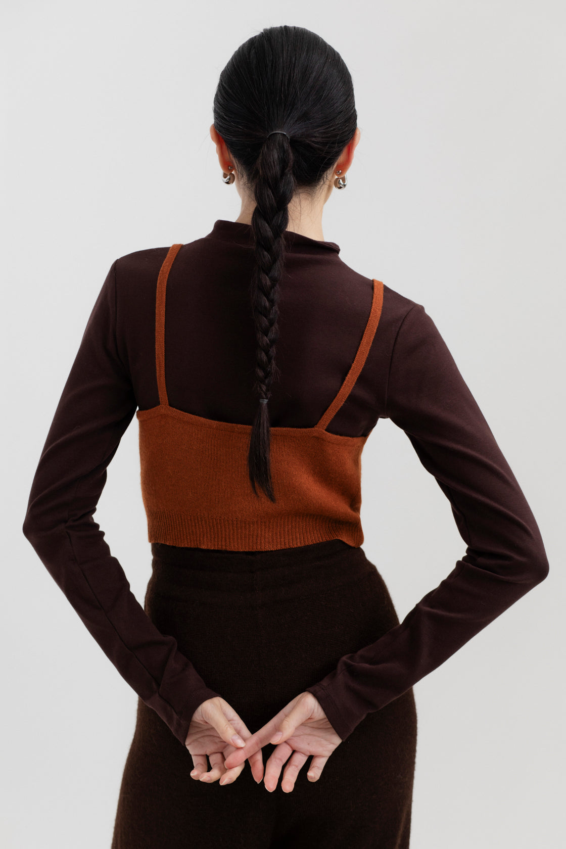 Halo Top in Burnt Orange, alpaca knit cropped top by Ahblo, worn by model