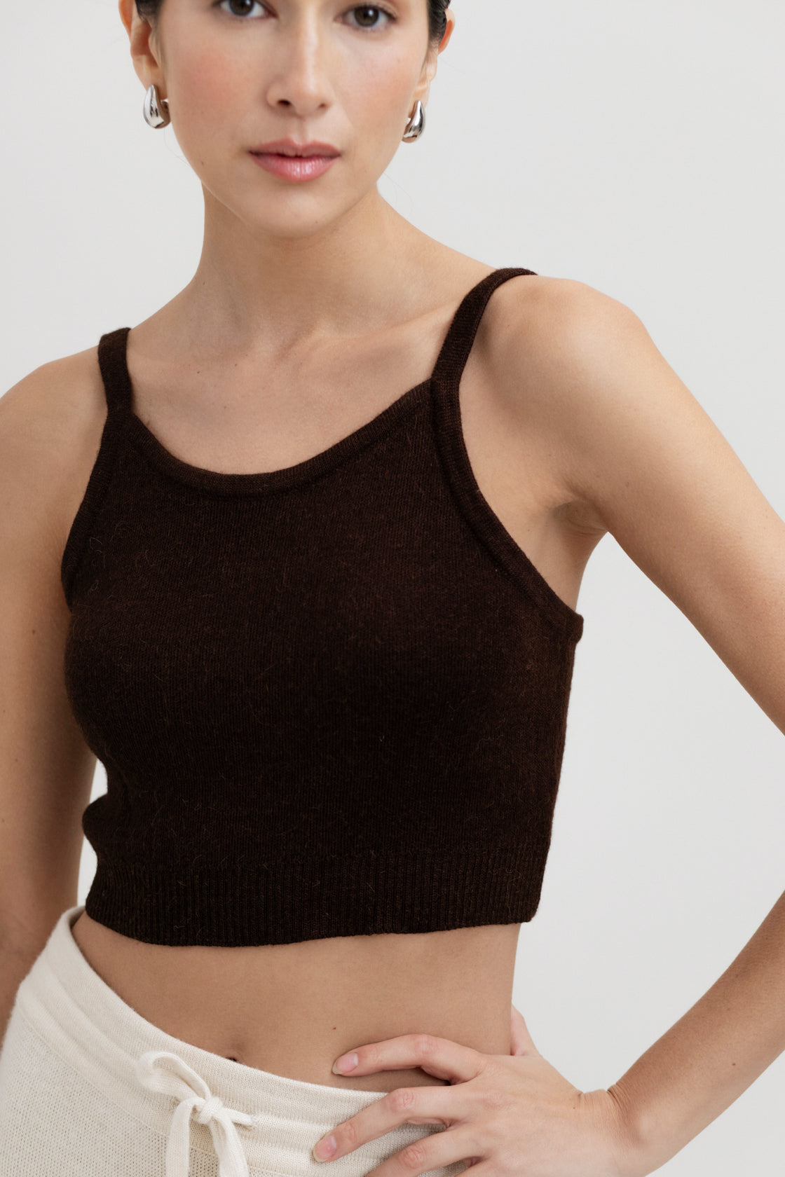 Halo Top in Chocolate Brown, alpaca knit cropped top by Ahblo, worn by model