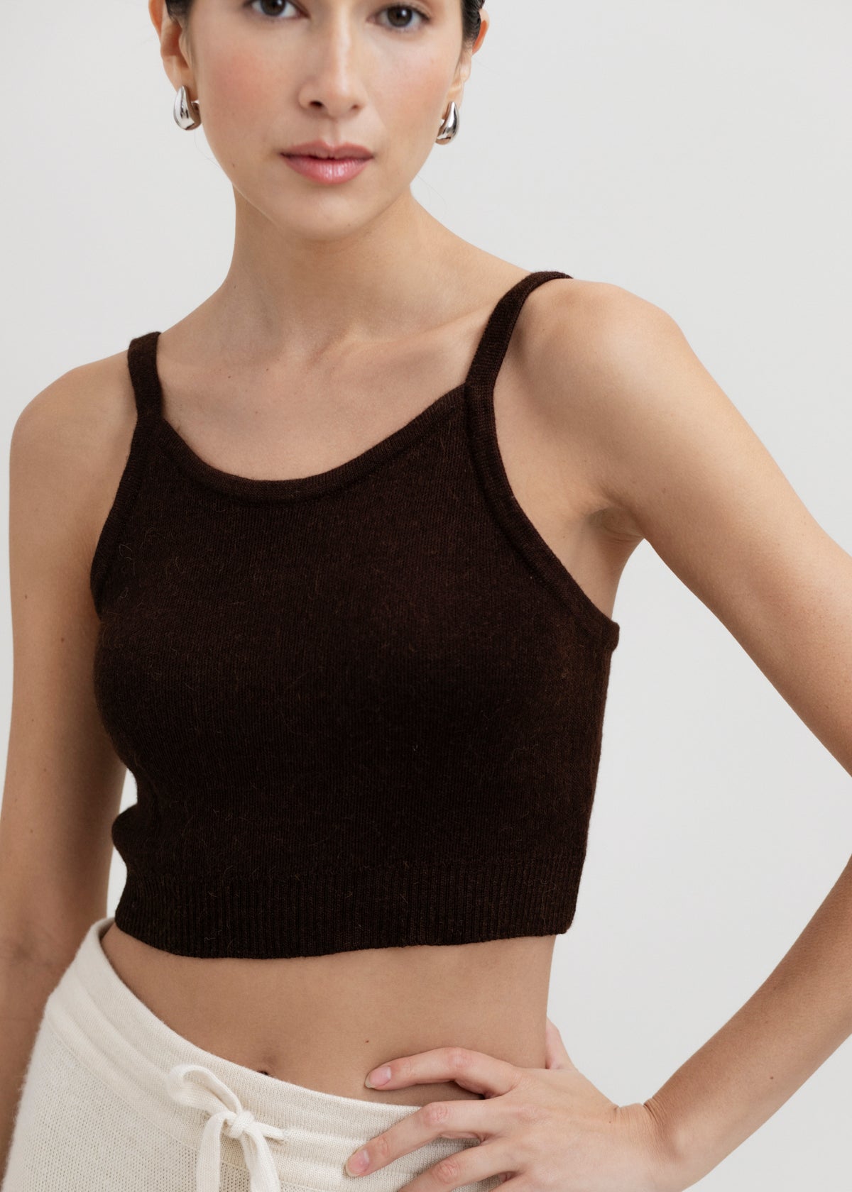 Halo Top in Chocolate Brown, alpaca knit cropped top by Ahblo, worn by model