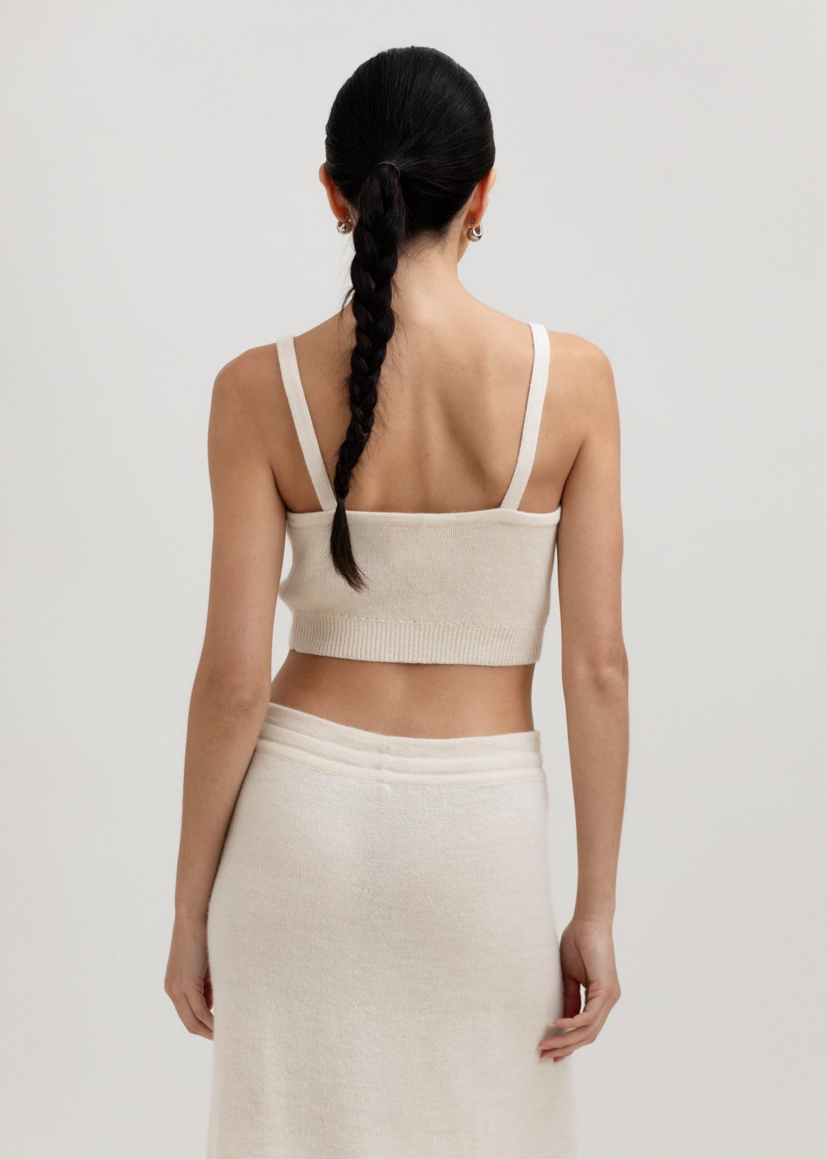 Halo Top in Cream, alpaca knit cropped top by Ahblo, worn by model