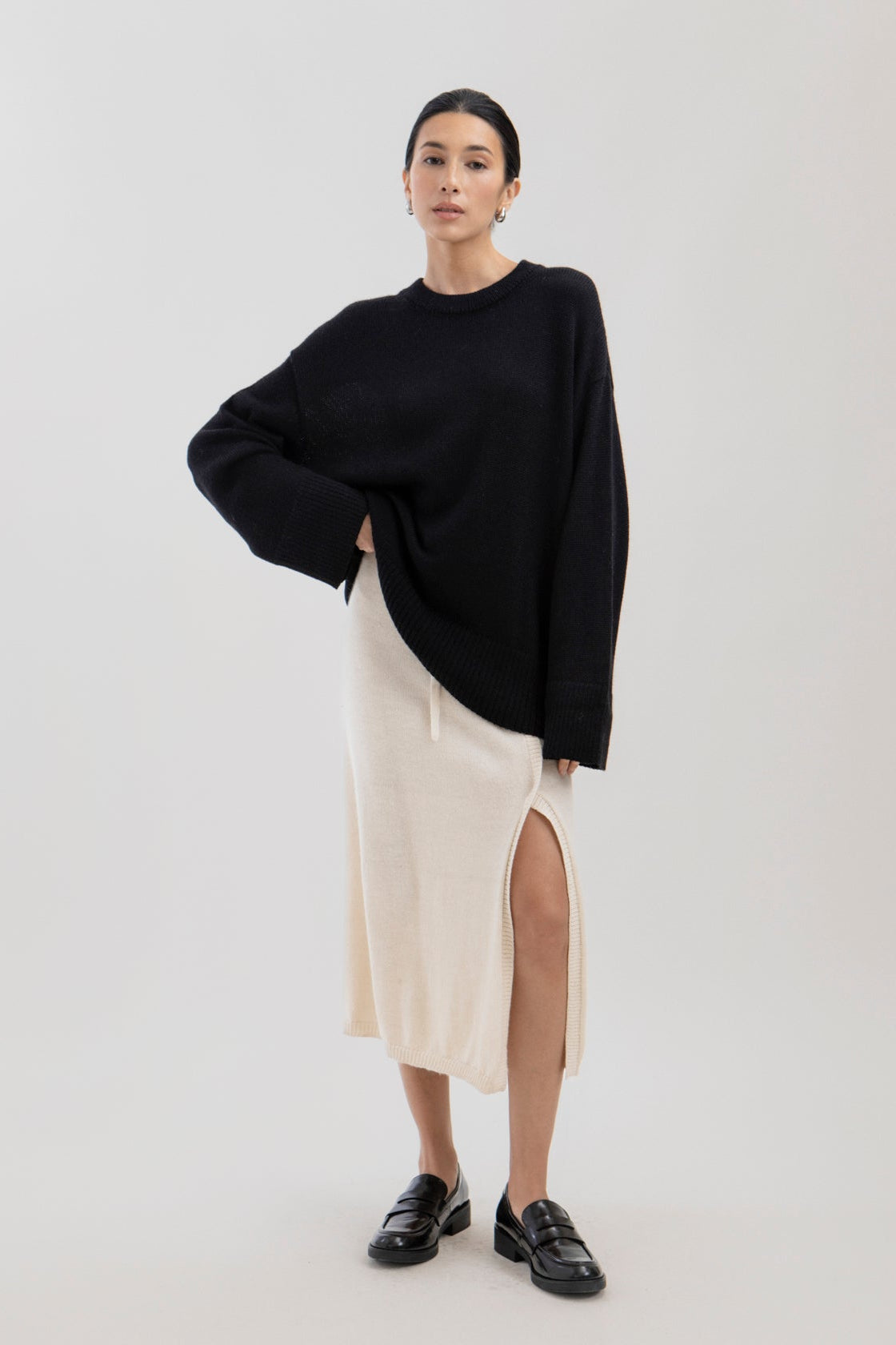 Haven Crew in Black, baby alpaca crew-neck sweater by Ahblo, worn by model