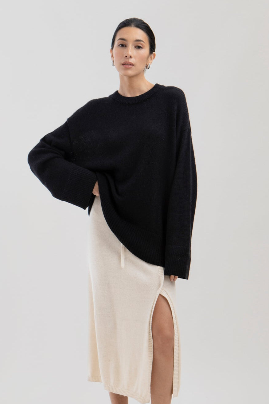 Haven Crew in Black, baby alpaca crew-neck sweater by Ahblo, worn by model
