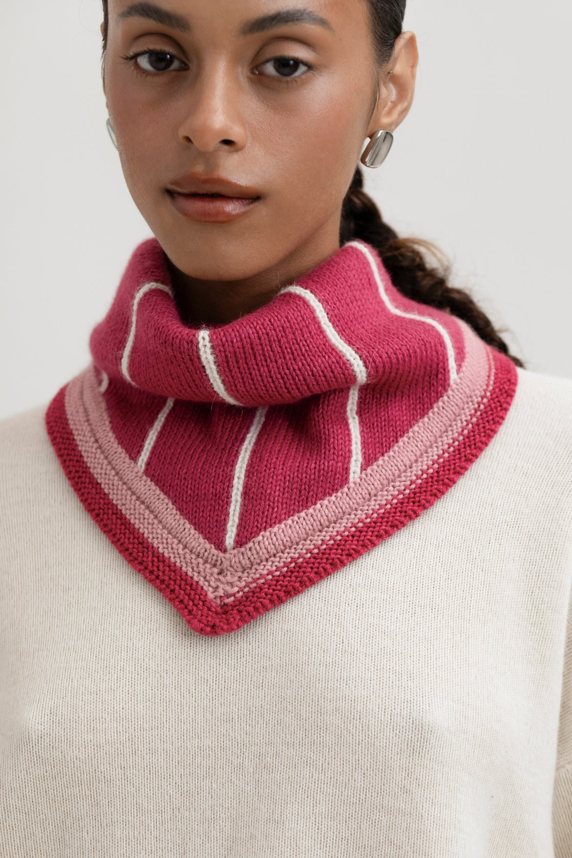 Lina Scarf in Wild Rose, reversible striped baby alpaca triangle scarf by Ahblo, worn by model