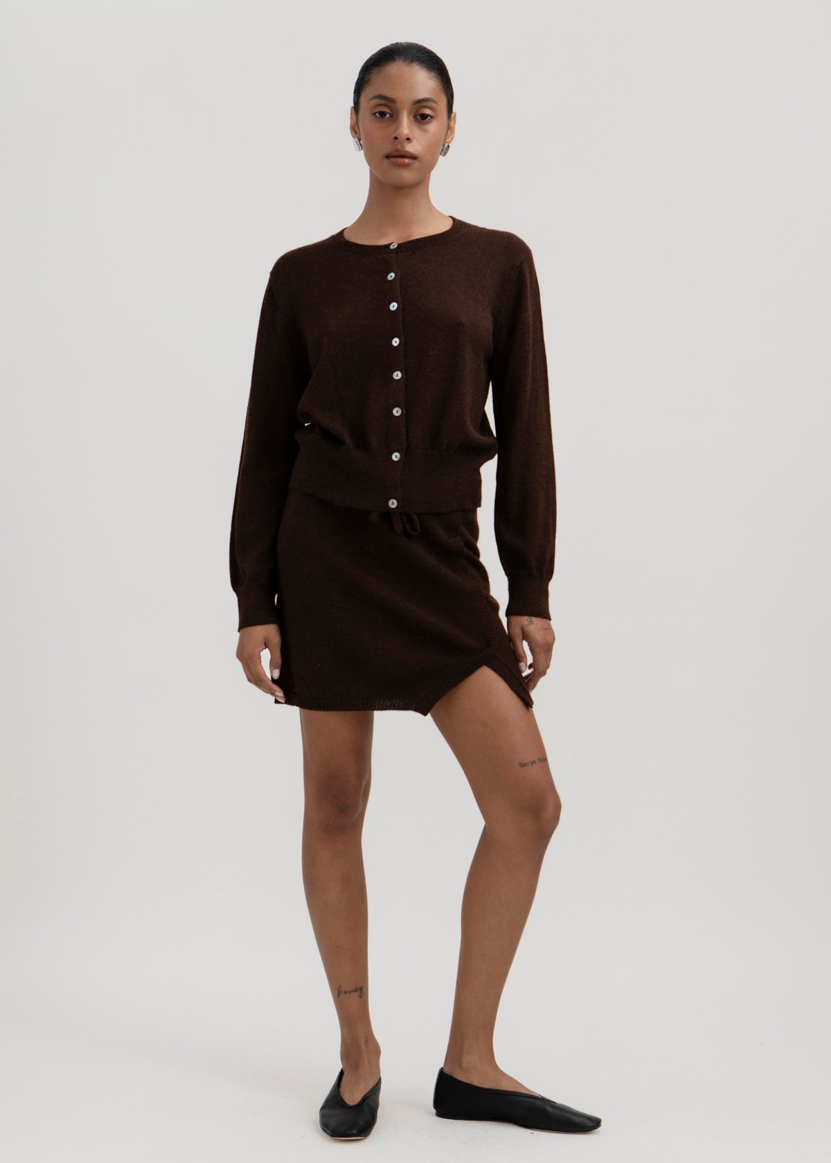 Lisa Mini Skirt in Chocolate Brown, baby alpaca jersey mini skirt by Ahblo, worn by model