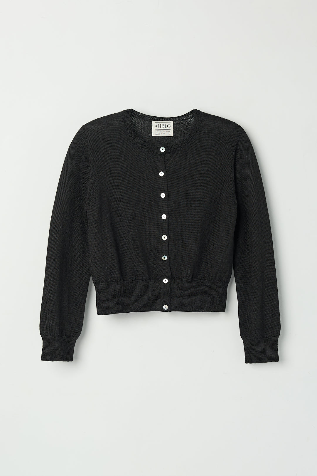 Lulu Cardigan in Black, alpaca cardigan by Ahblo, flat lay