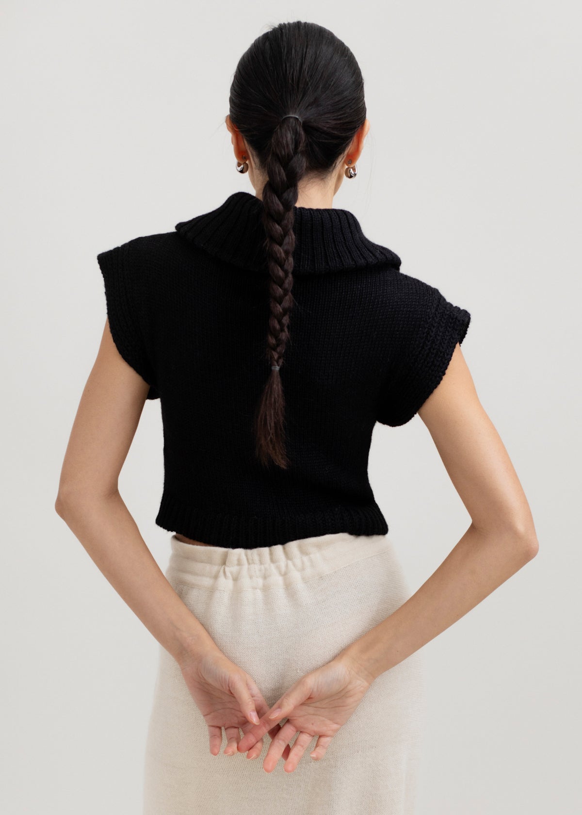 Luna Top in Black, baby alpaca knit top by Ahblo, worn by model