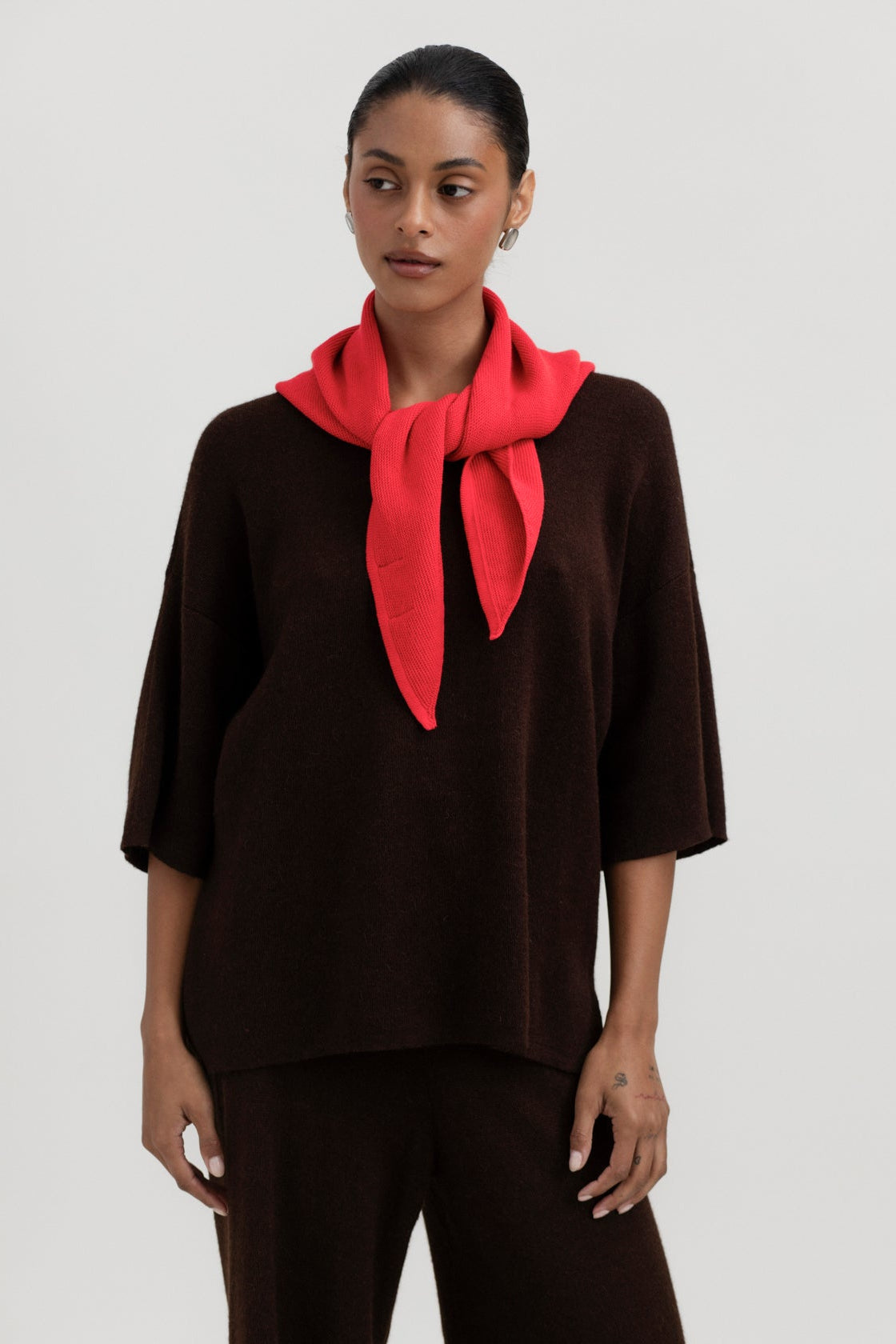 Nora Scarf in Cerise, cotton and baby alpaca triangle scarf by Ahblo, worn by model