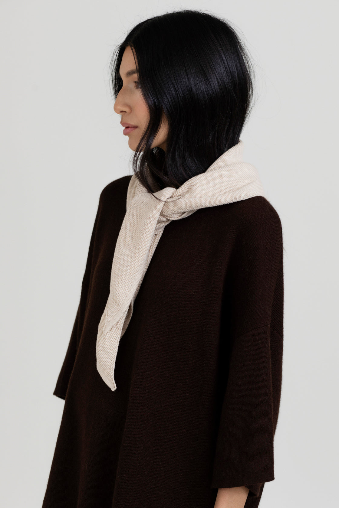 Nora Scarf in Praline, cotton and baby alpaca triangle scarf by Ahblo, worn by model