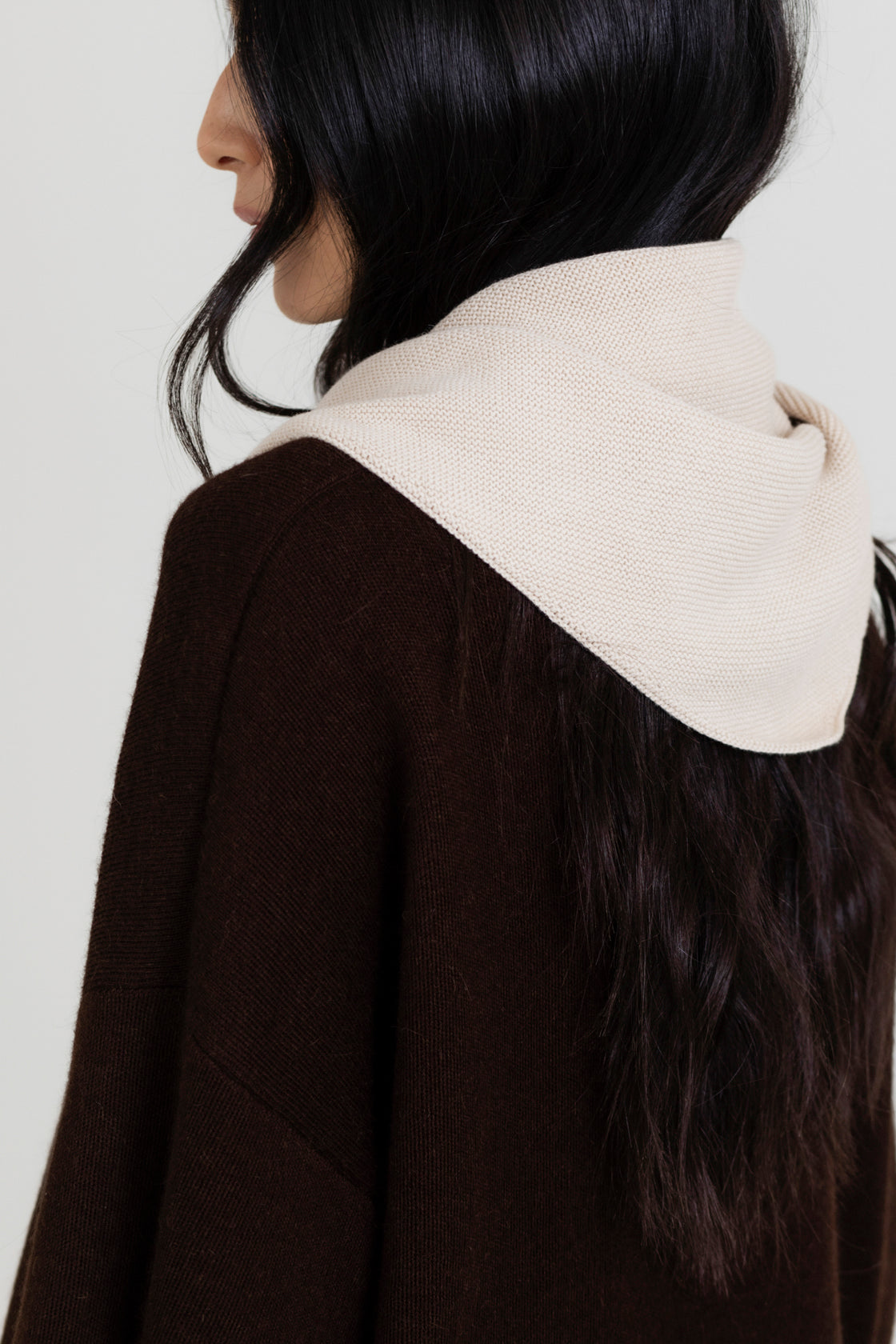 Nora Scarf in Praline, cotton and baby alpaca triangle scarf by Ahblo, worn by model