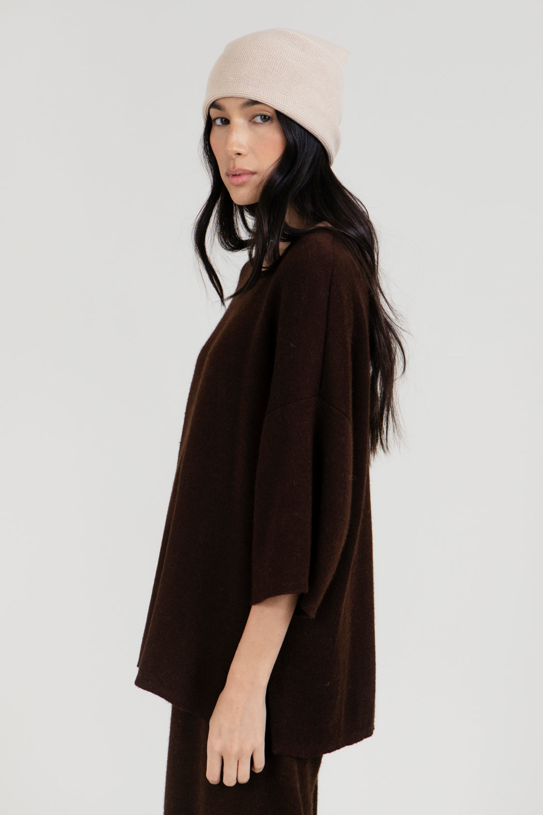 Nora Scarf in Praline, cotton and baby alpaca triangle scarf by Ahblo, worn by model