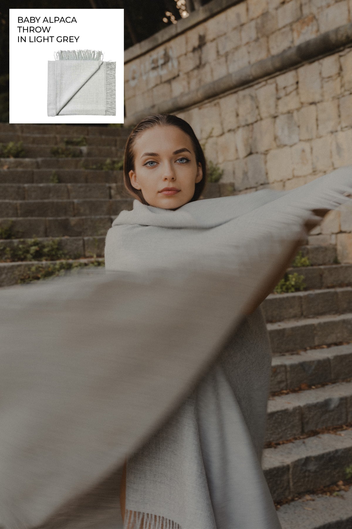 Riley Scarf in Mist Grey, blanket-size baby alpaca scarf by Ahblo, worn by model