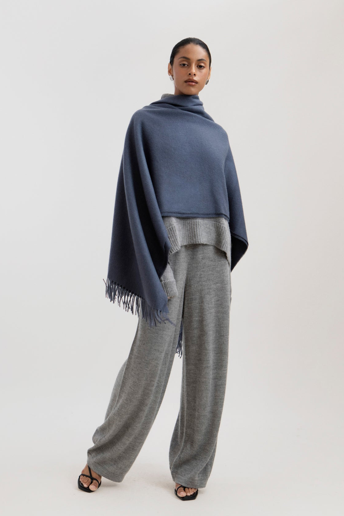 Riley Scarf in Slate, blanket-size baby alpaca scarf by Ahblo, worn by model