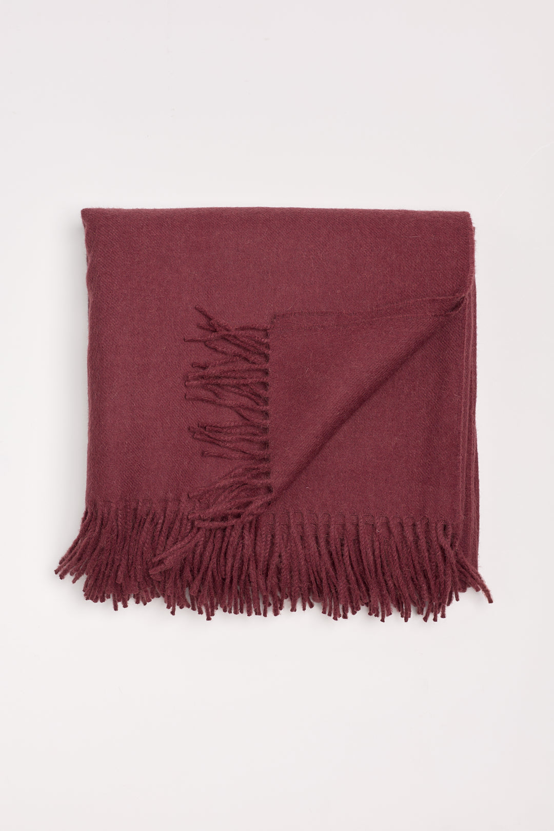 Rowan Scarf in Burgundy, fringed baby alpaca scarf by Ahblo, flat lay