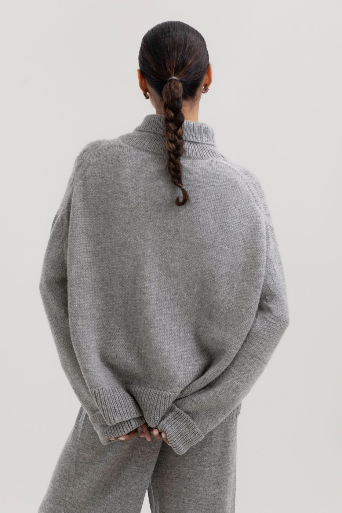 Sierra Cable Knit in Mist Grey, oversized baby alpaca cable-knit sweater by Ahblo, worn by model