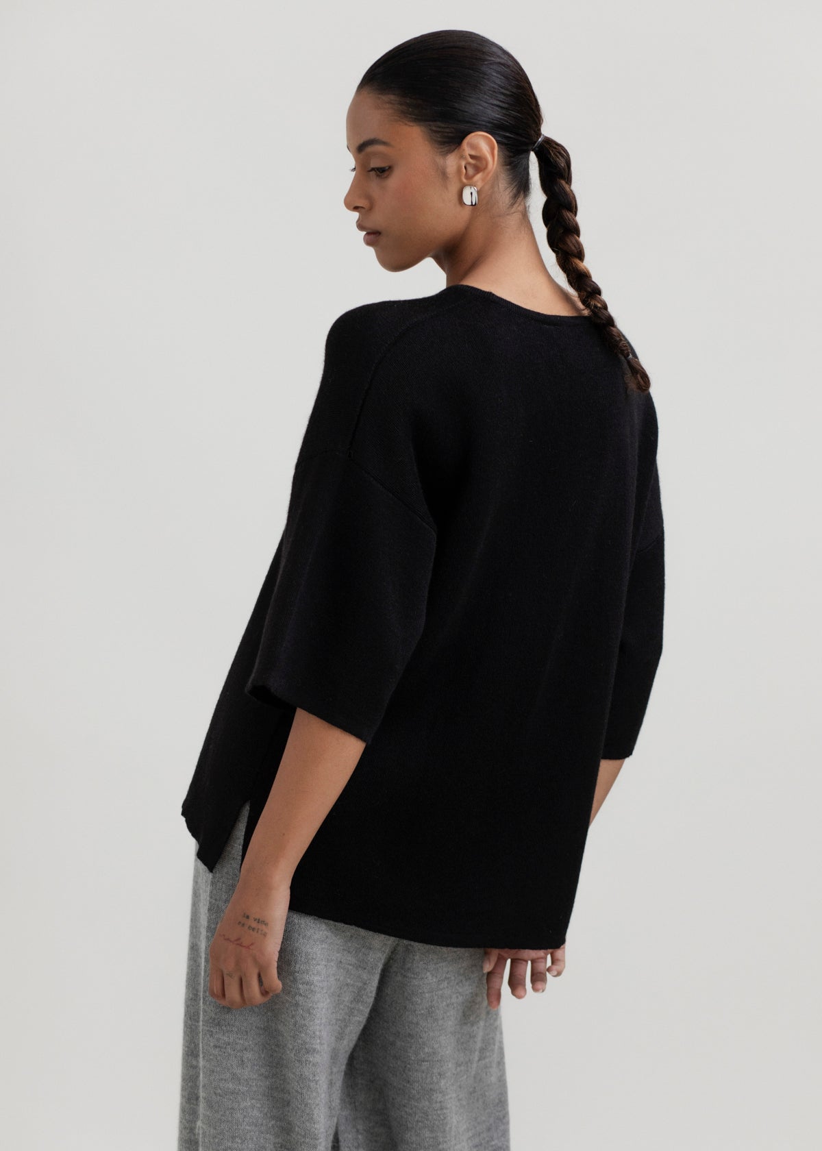 Solace Tee Sweater in Black, alpaca tee sweater by Ahblo, worn by model