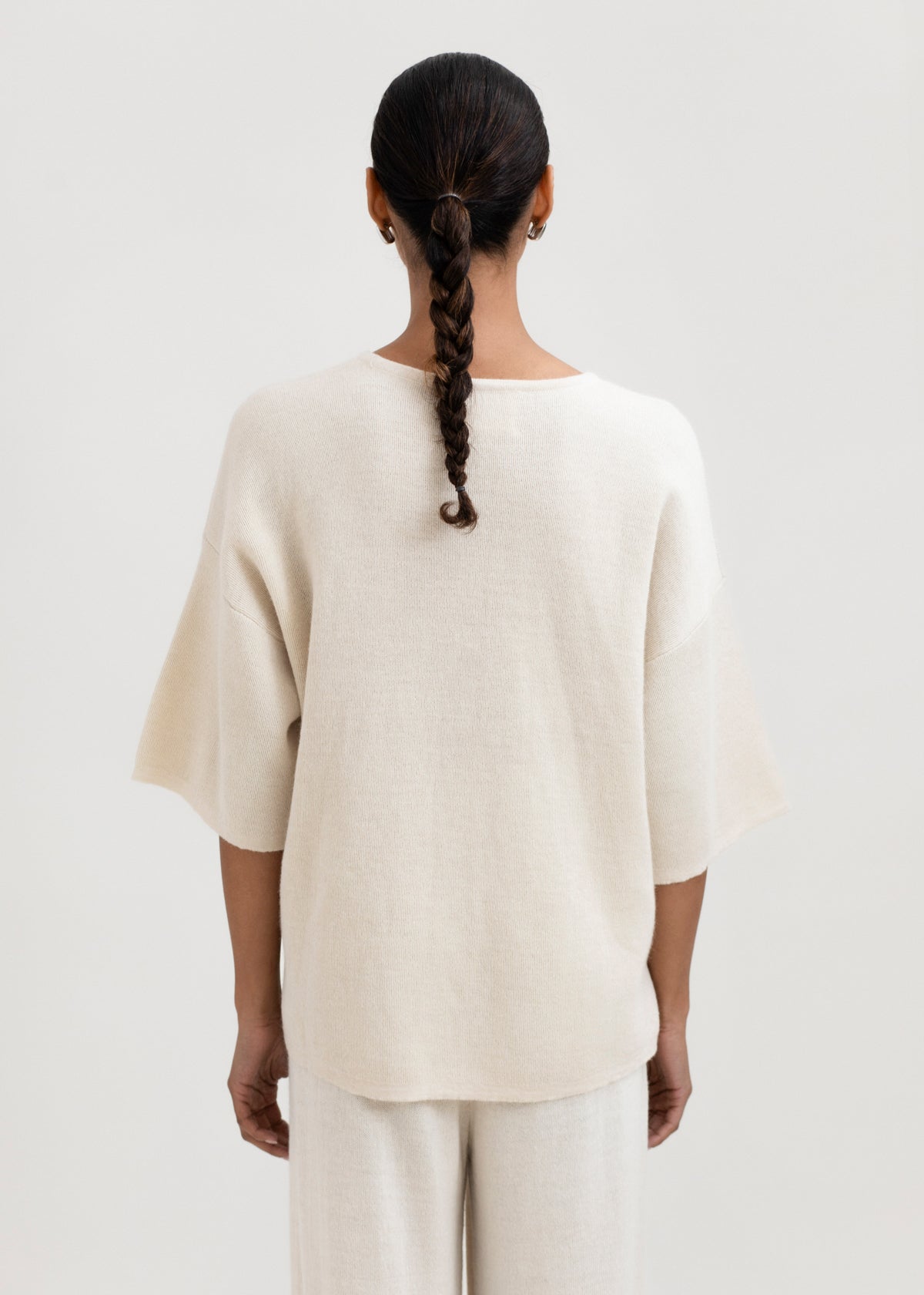 Solace Tee Sweater in Cream, alpaca tee sweater by Ahblo, worn by model