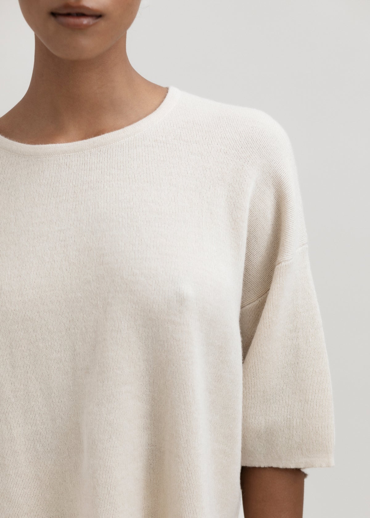 Solace Tee Sweater in Cream, alpaca tee sweater by Ahblo, worn by model