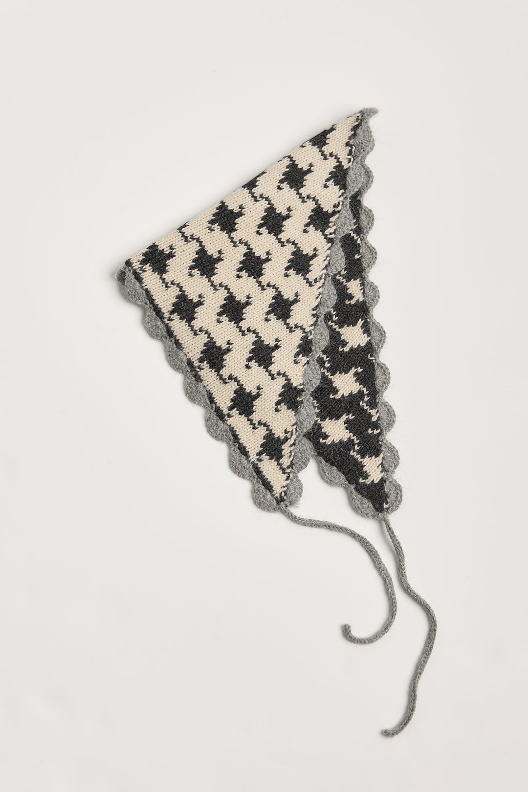 Tessa Scarf in Grey, reversible houndstooth baby alpaca triangle scarf by Ahblo, flat lay