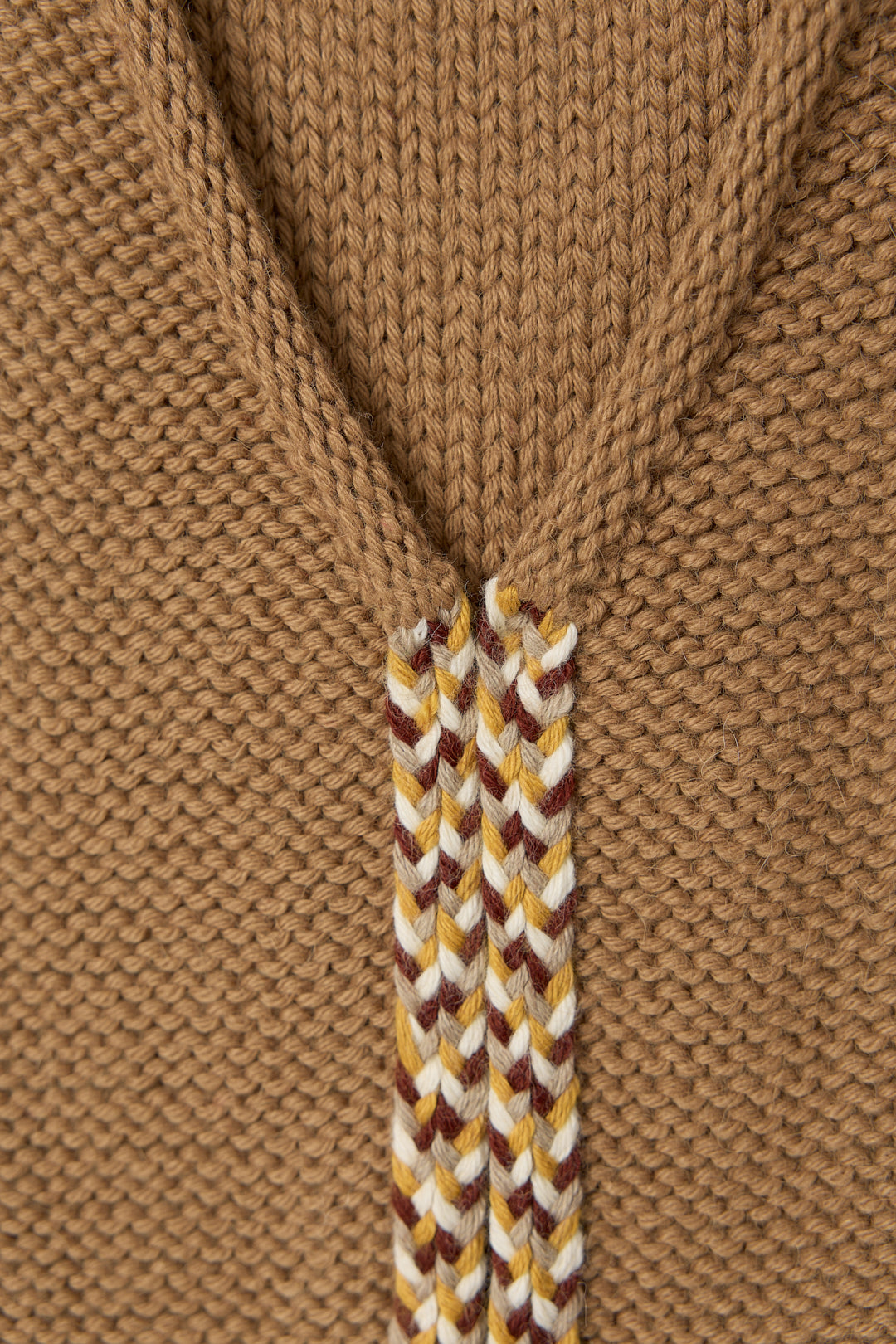 Vela Braid Vest in Caramel, baby alpaca knit vest with hand-braided trim by Ahblo, flat lay