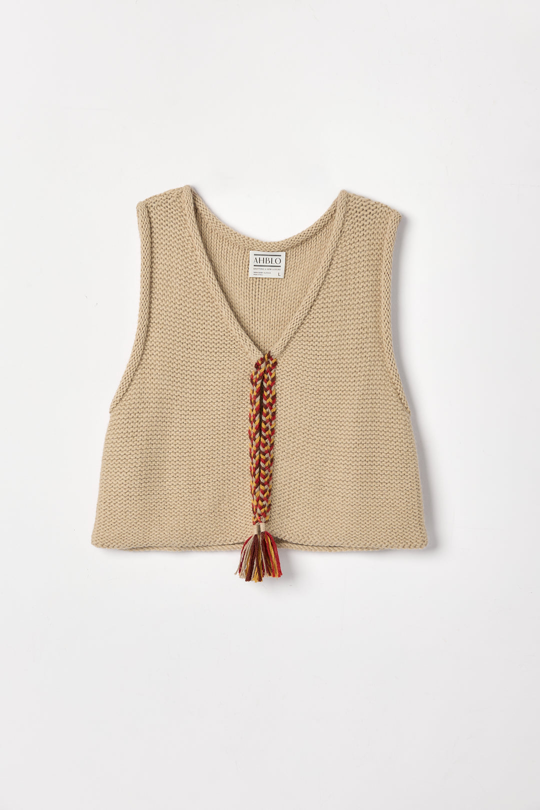 Vela Braid Vest in Praline, baby alpaca knit vest with hand-braided trim by Ahblo, flat lay
