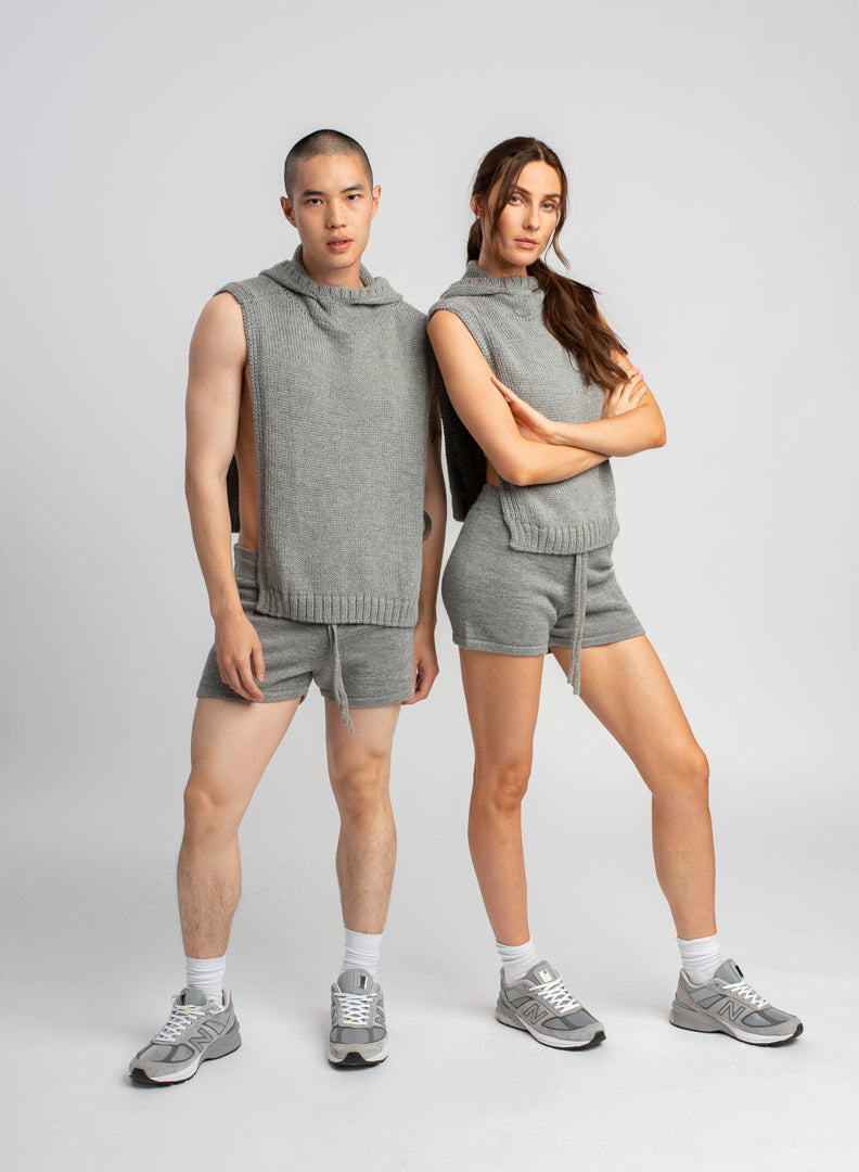 Models wearing knitwear alpaca wool light grey shorts