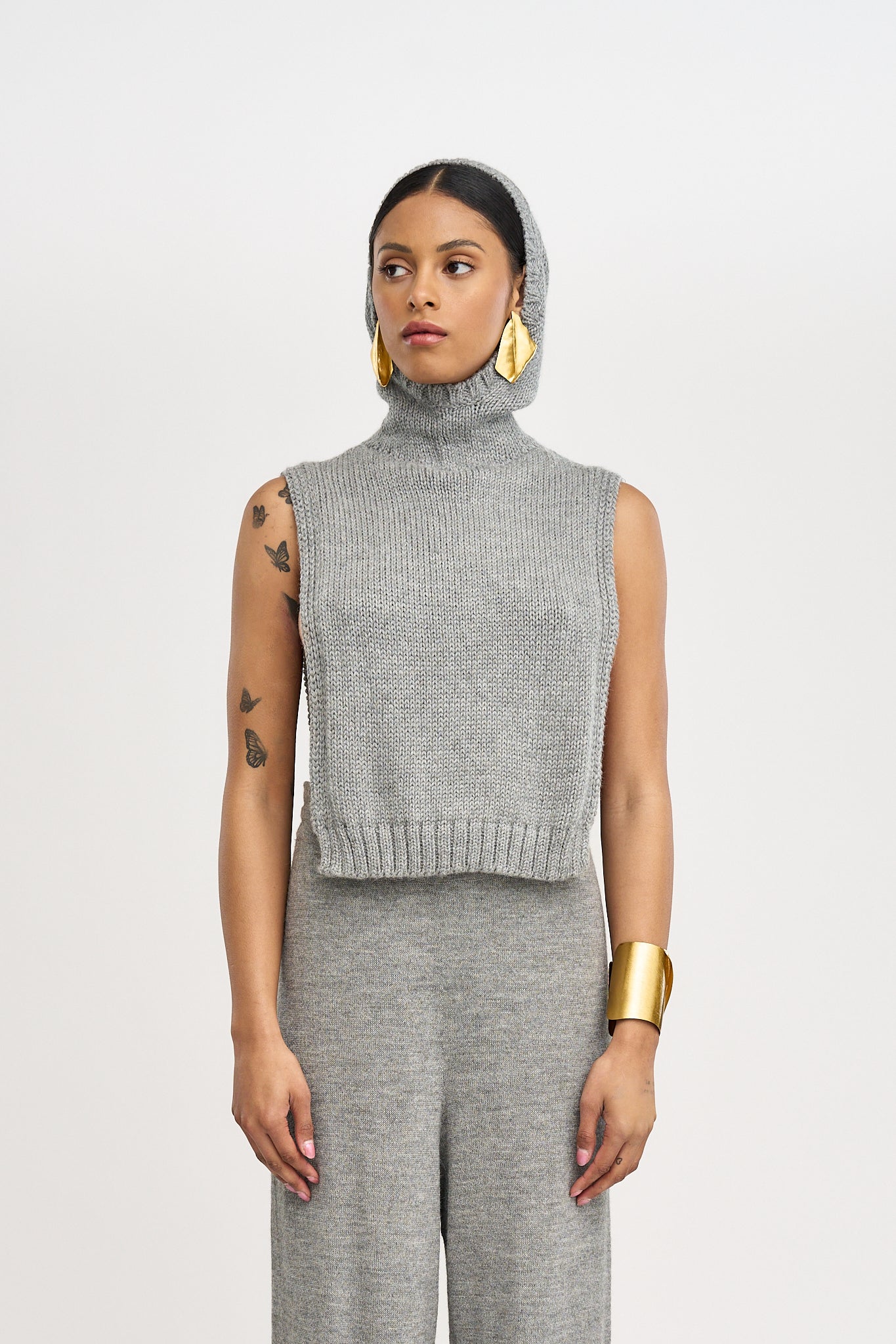 The Alpaca Knit Poncho in Light Grey