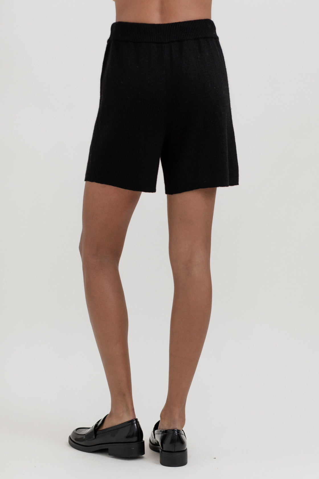 Airy Shorts in Black, alpaca and silk knit shorts by Ahblo, worn by model