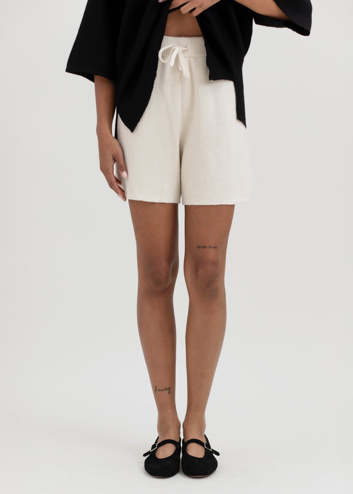 Airy Shorts in Cream, alpaca and silk knit shorts by Ahblo, worn by model