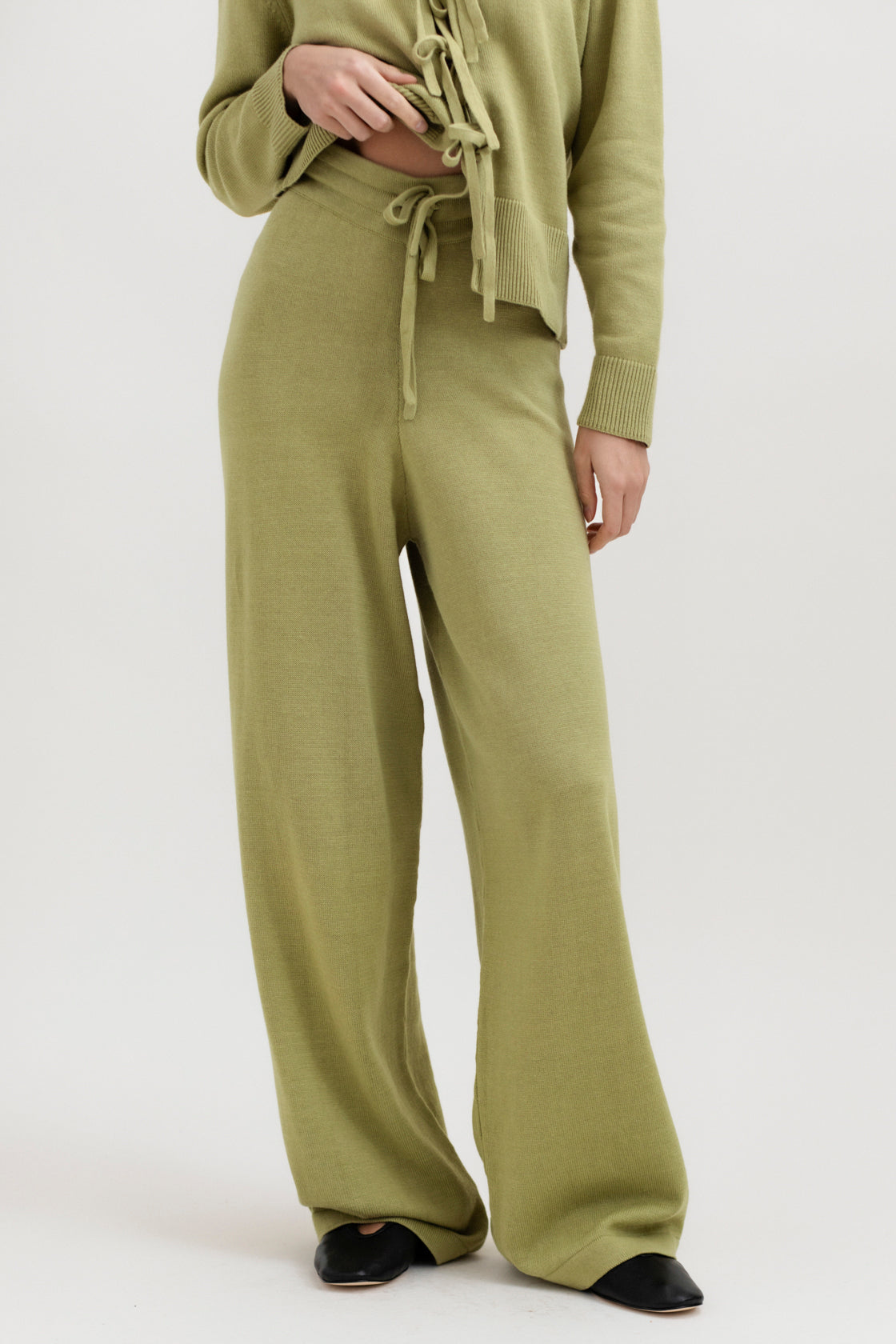 Alba Pants in Olive, cotton and baby alpaca wide-leg pants by Ahblo, worn by model